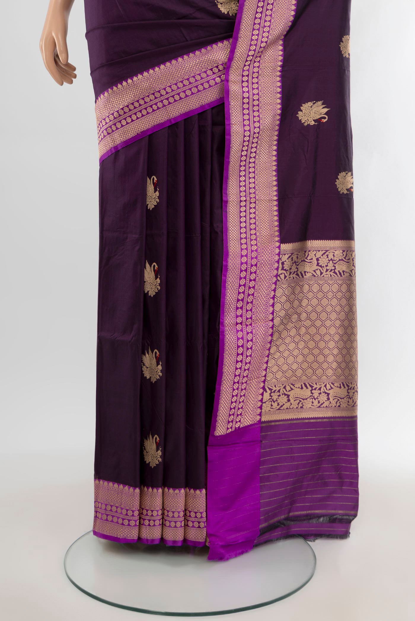 Pleats and pallu of Violet Banarasi Katan Silk Saree with Zari Butta on the body and Zari Border. 