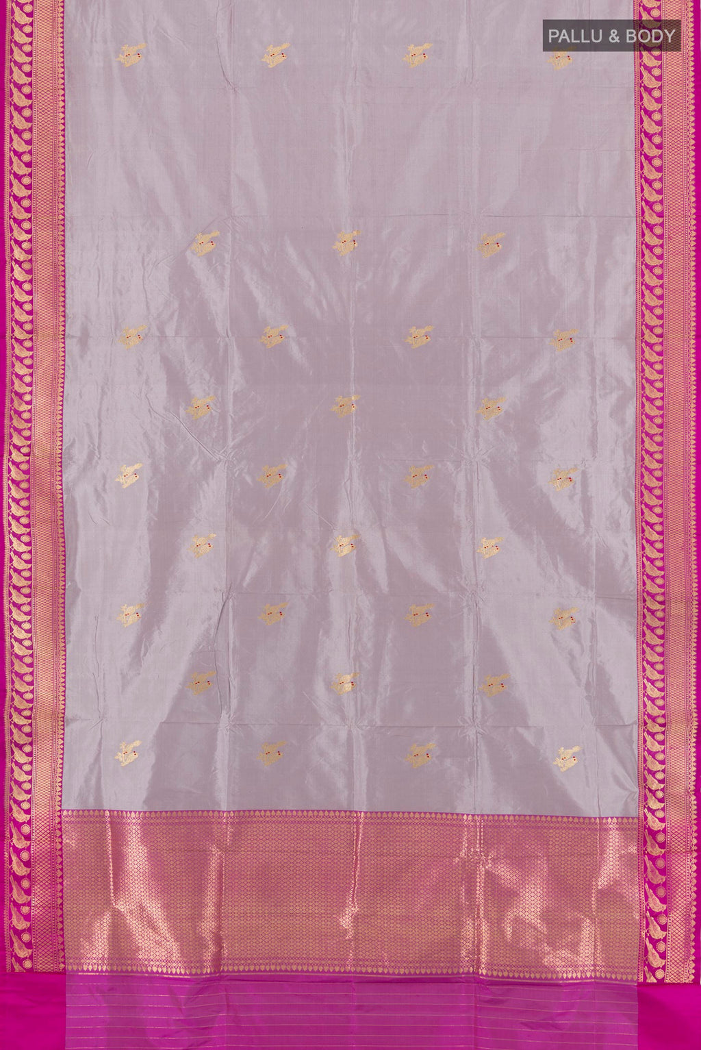 Flat view of Lilac Banarasi Katan Silk Saree with Zari Butta on the body and Zari Border. 