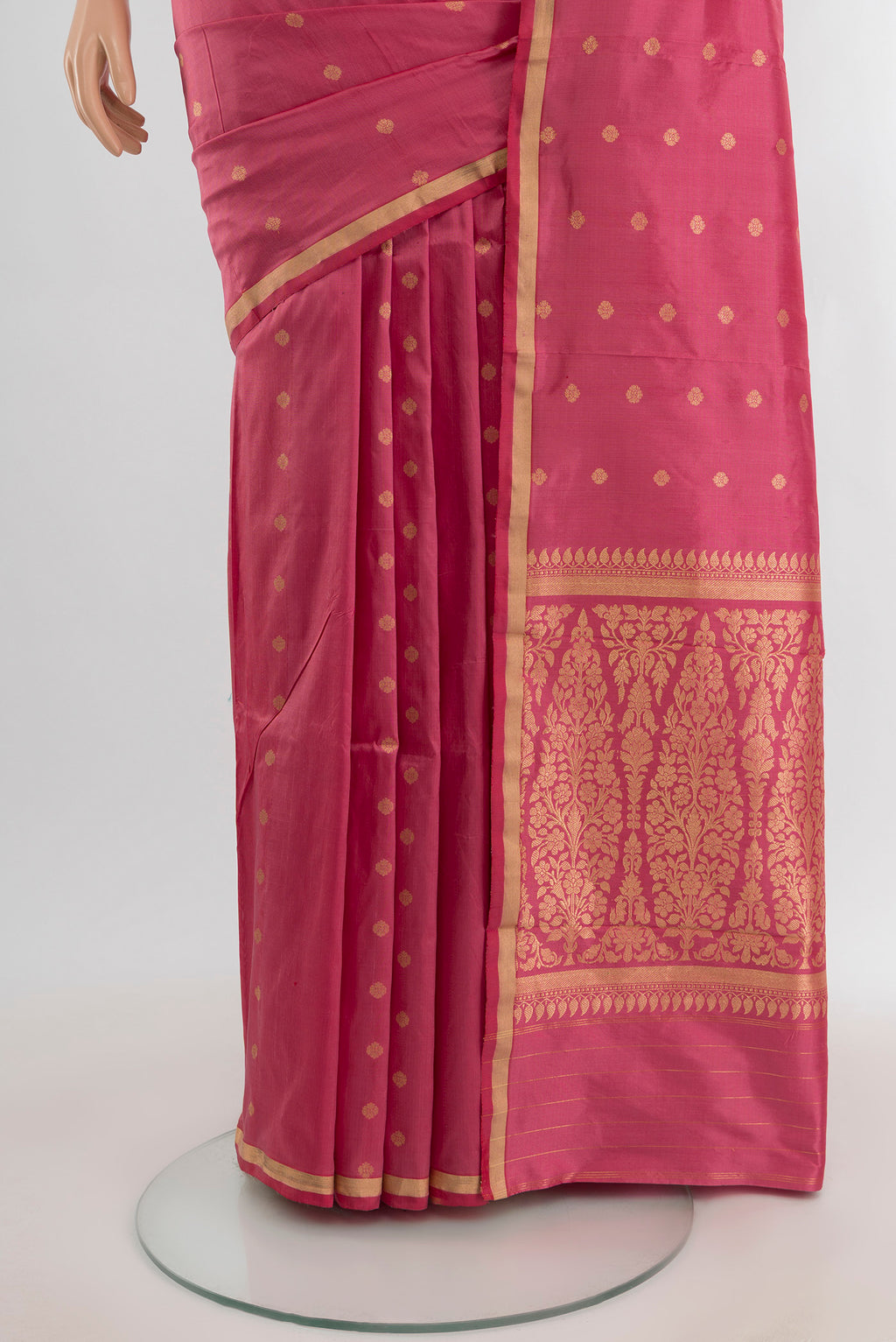 Pleats and pallu of Rose pink Banarasi Katan Silk Saree with Zari Butta on the body and Zari Border. 