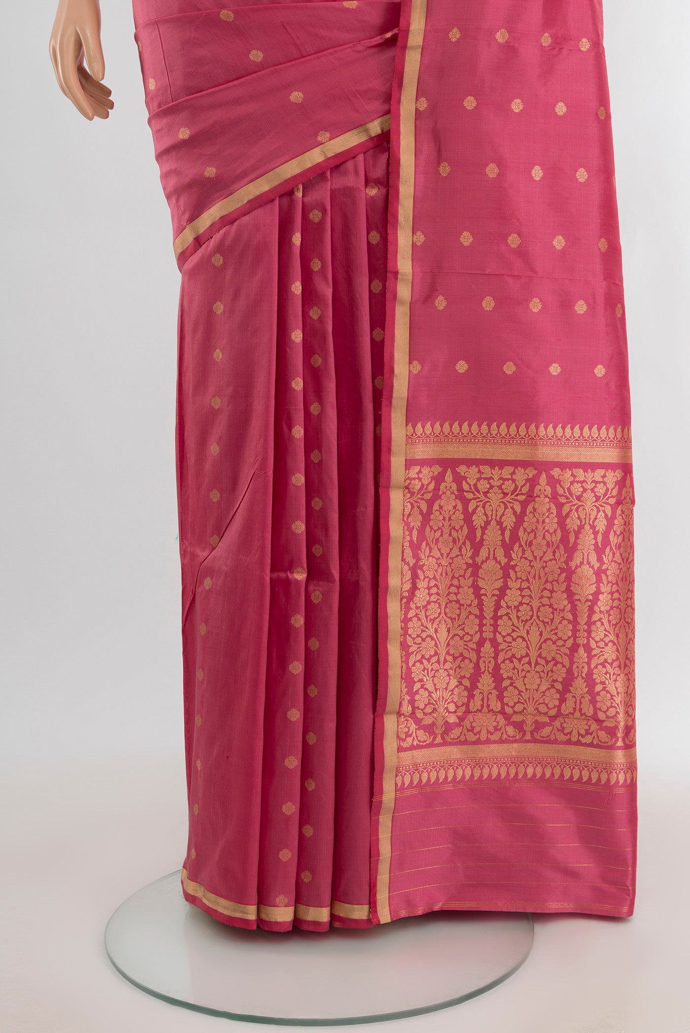 Pleats and pallu of Rose pink Banarasi Katan Silk Saree with Zari Butta on the body and Zari Border. 