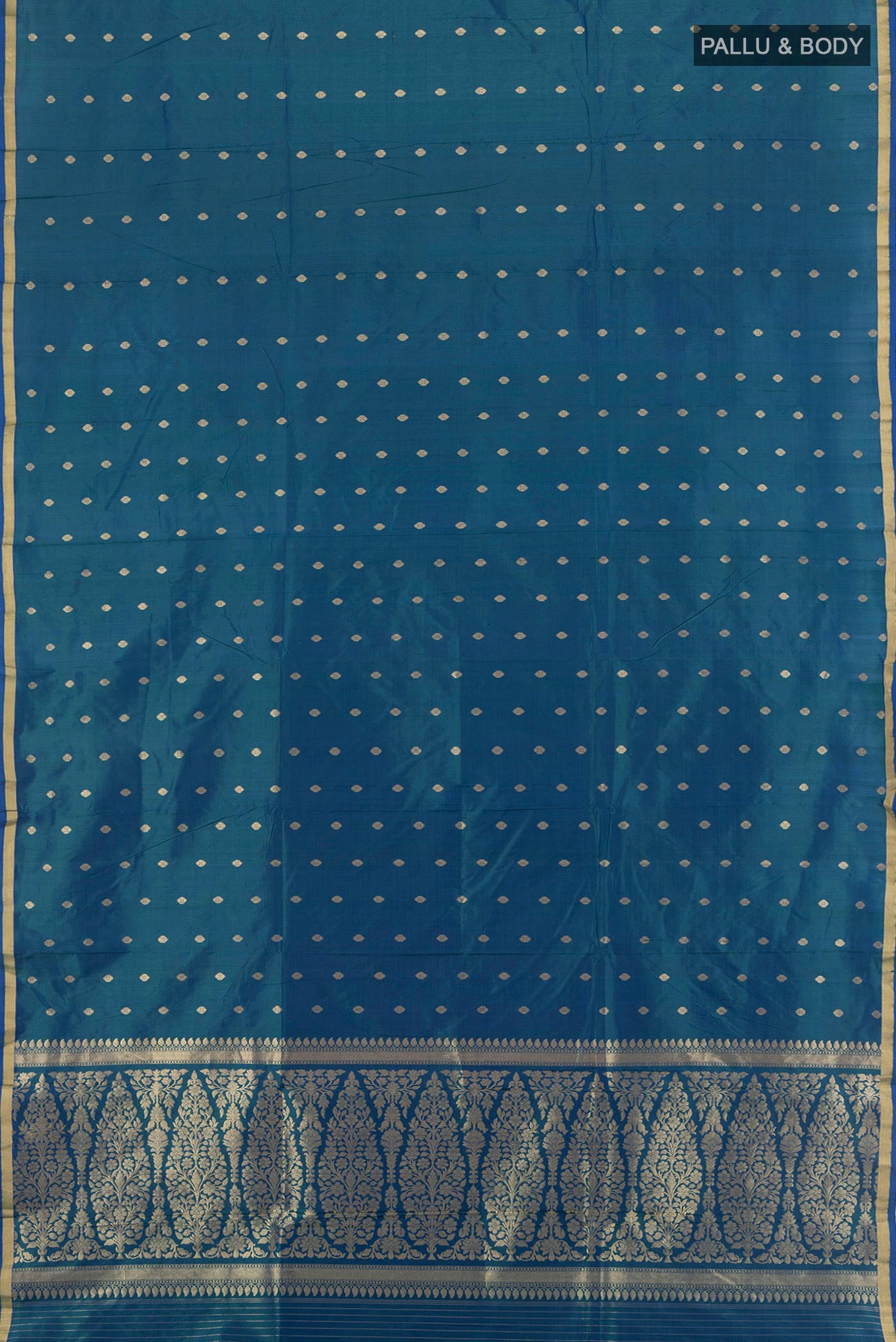Flat view of Peacock Blue Banarasi Katan Silk Saree with Zari Butta on the body and Zari Border. 