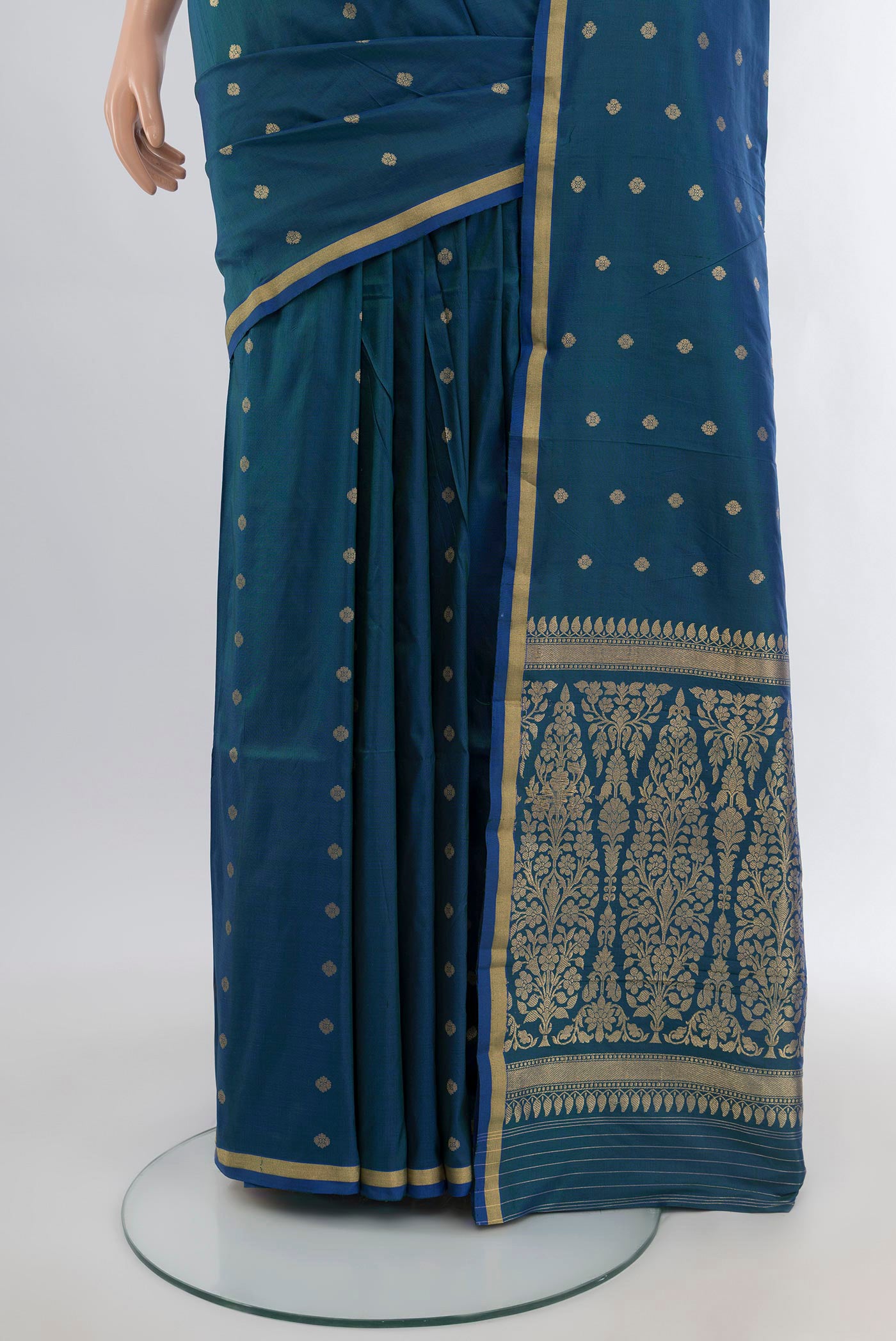 Pleats and pallu of Peacock Blue Banarasi Katan Silk Saree with Zari Butta on the body and Zari Border. 