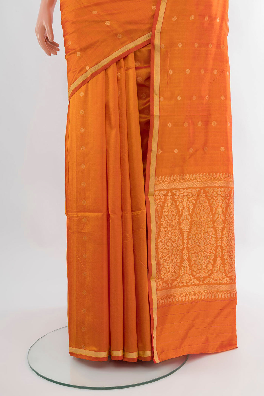 Pleats and pallu of Yellow Banarasi Katan Silk Saree with Zari Butta on the body and Zari Border. 