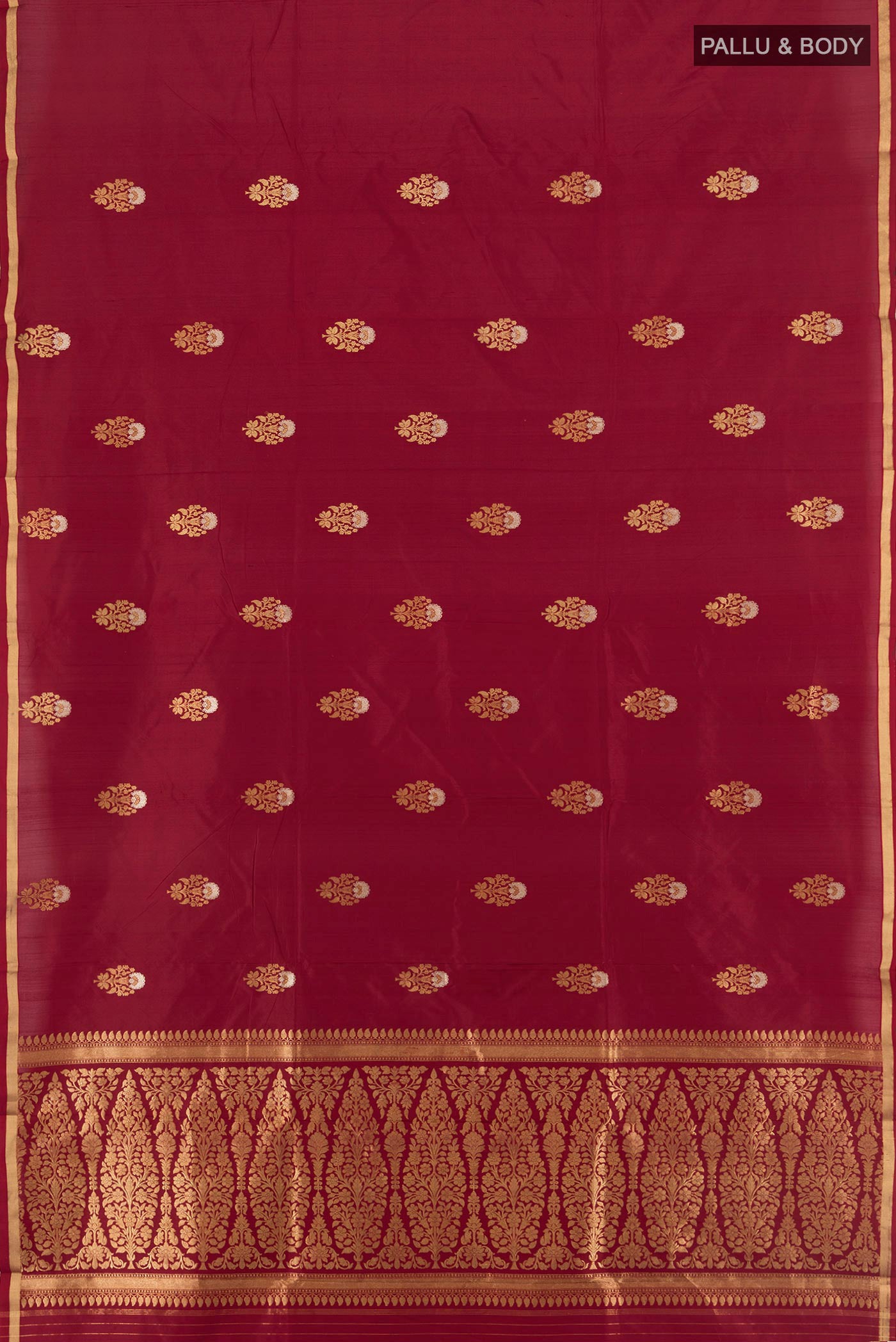 Flat view of Maroon Banarasi Katan Silk Saree with Zari Butta on the body and Zari Border. 