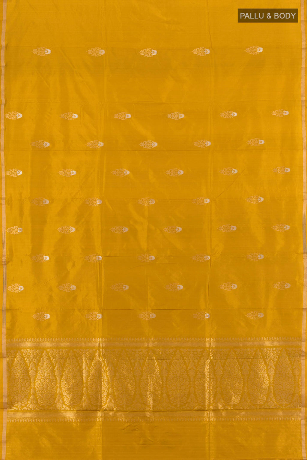 Flat view of Mustard Banarasi Katan Silk Saree with Zari Butta on the body and Zari Border. 