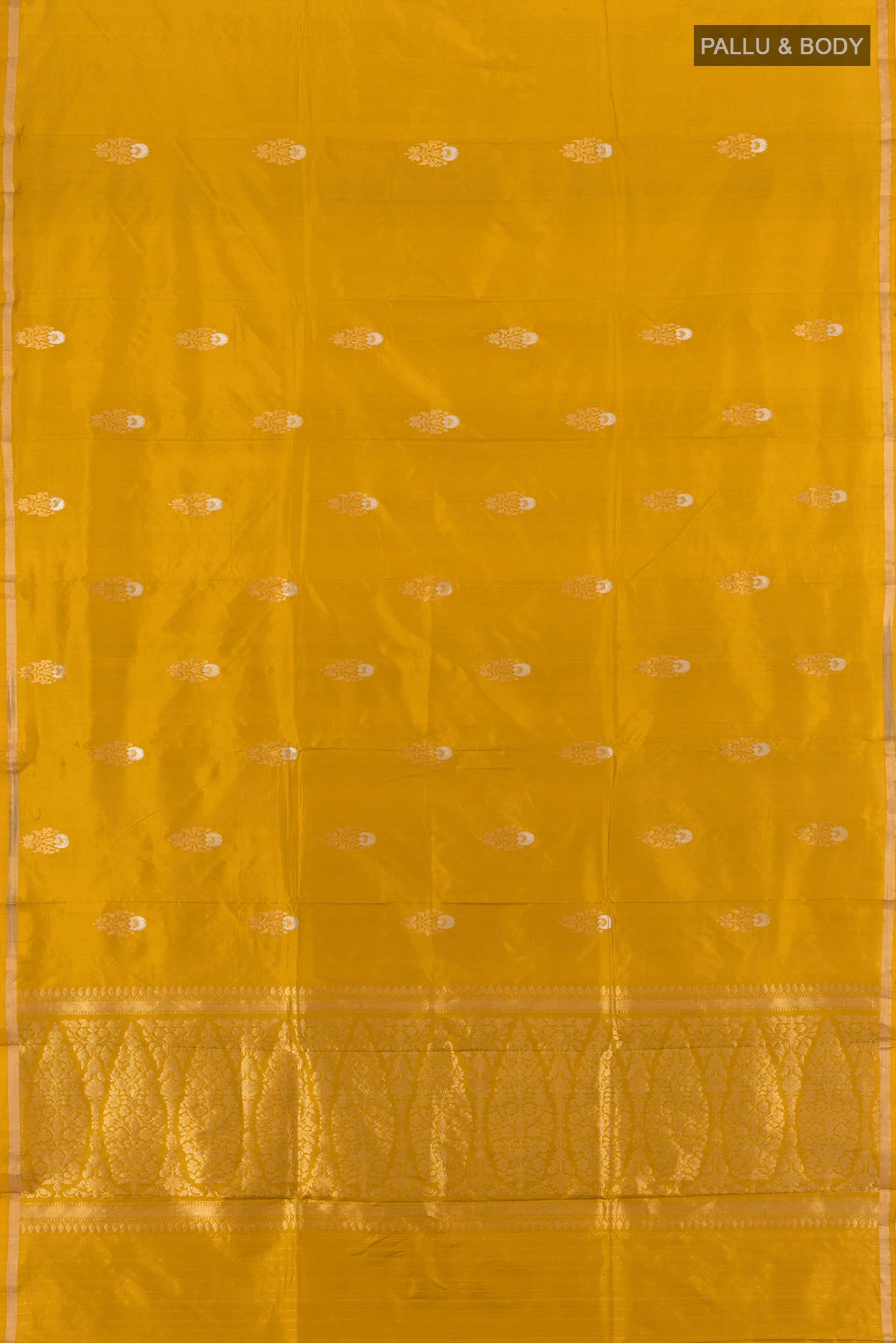 Flat view of Mustard Banarasi Katan Silk Saree with Zari Butta on the body and Zari Border. 
