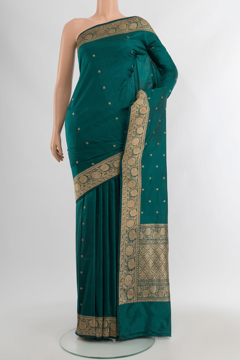 Teal Banarasi Katan Silk Saree with Zari Butta on the body and Zari Border.  displayed on a mannequin