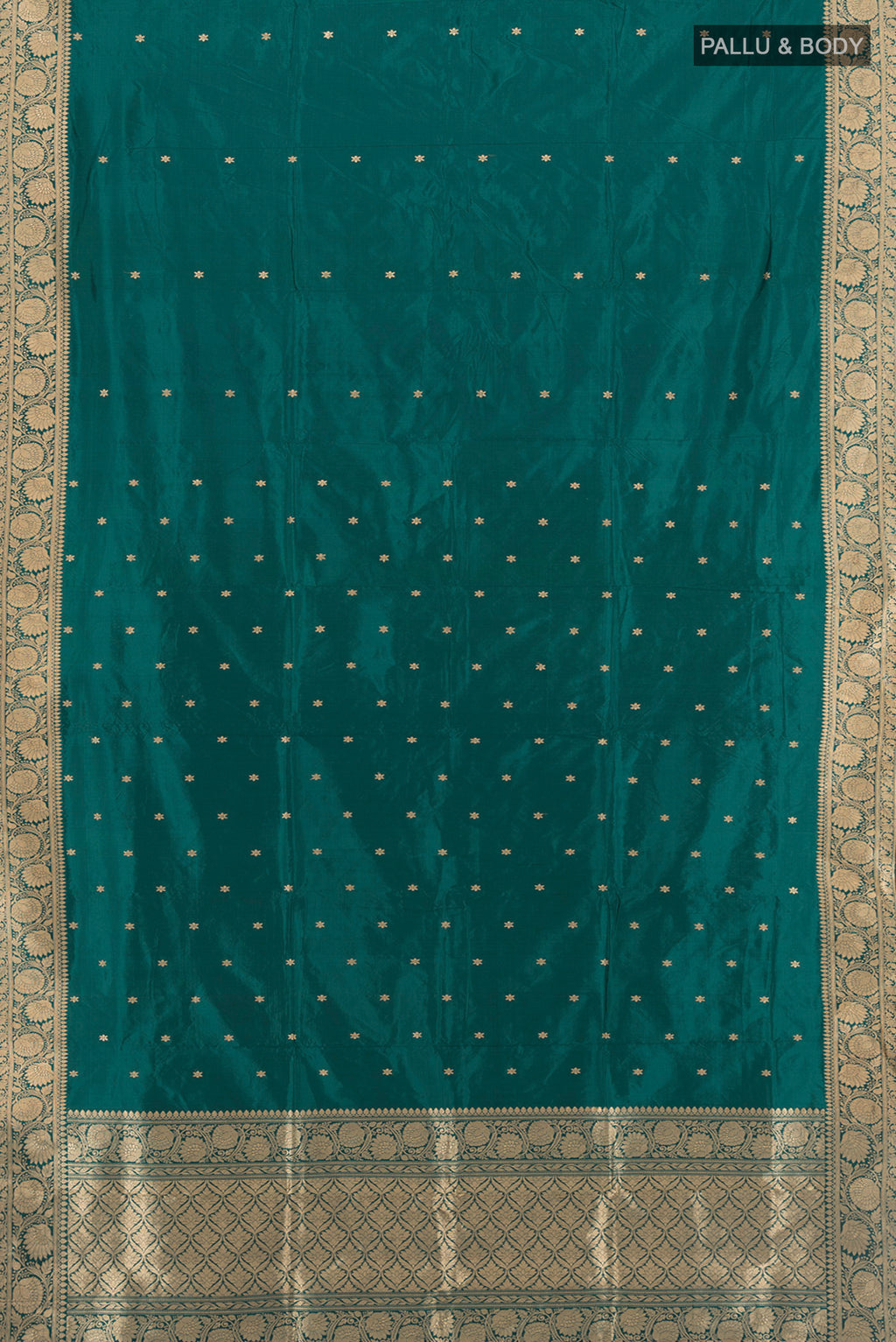 Flat view of Teal Banarasi Katan Silk Saree with Zari Butta on the body and Zari Border. 