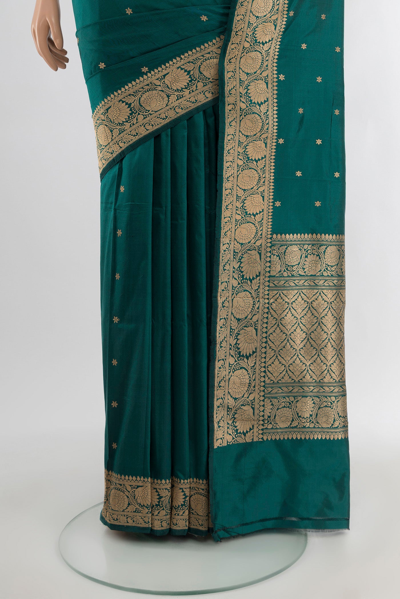 Pleats and pallu of Teal Banarasi Katan Silk Saree with Zari Butta on the body and Zari Border. 