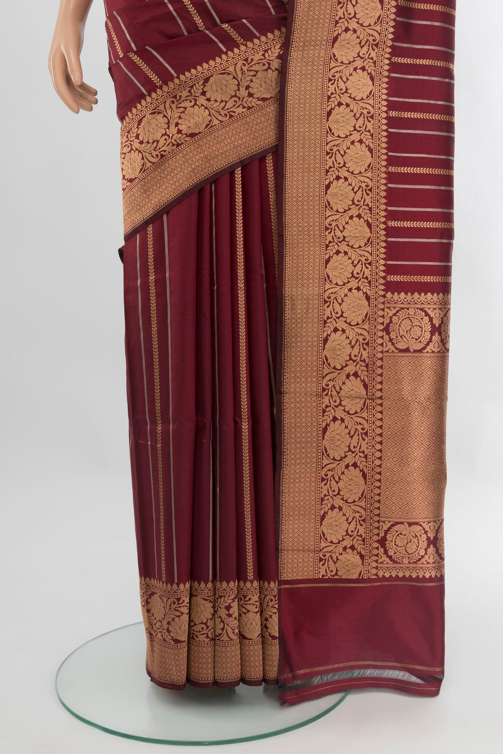 Pleats and pallu of Maroon Banarasi Katan Silk Saree with Stripes on the body and Zari Border. 