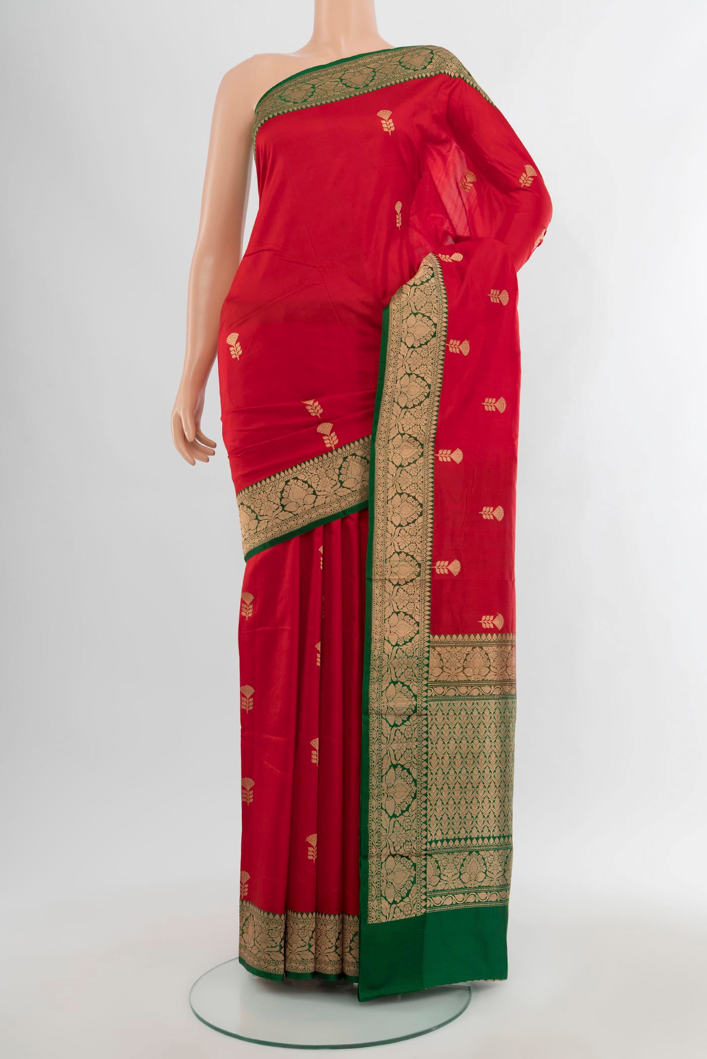 Red Banarasi Katan Silk Saree with Zari Butta on the body and Zari Border.  displayed on a mannequin