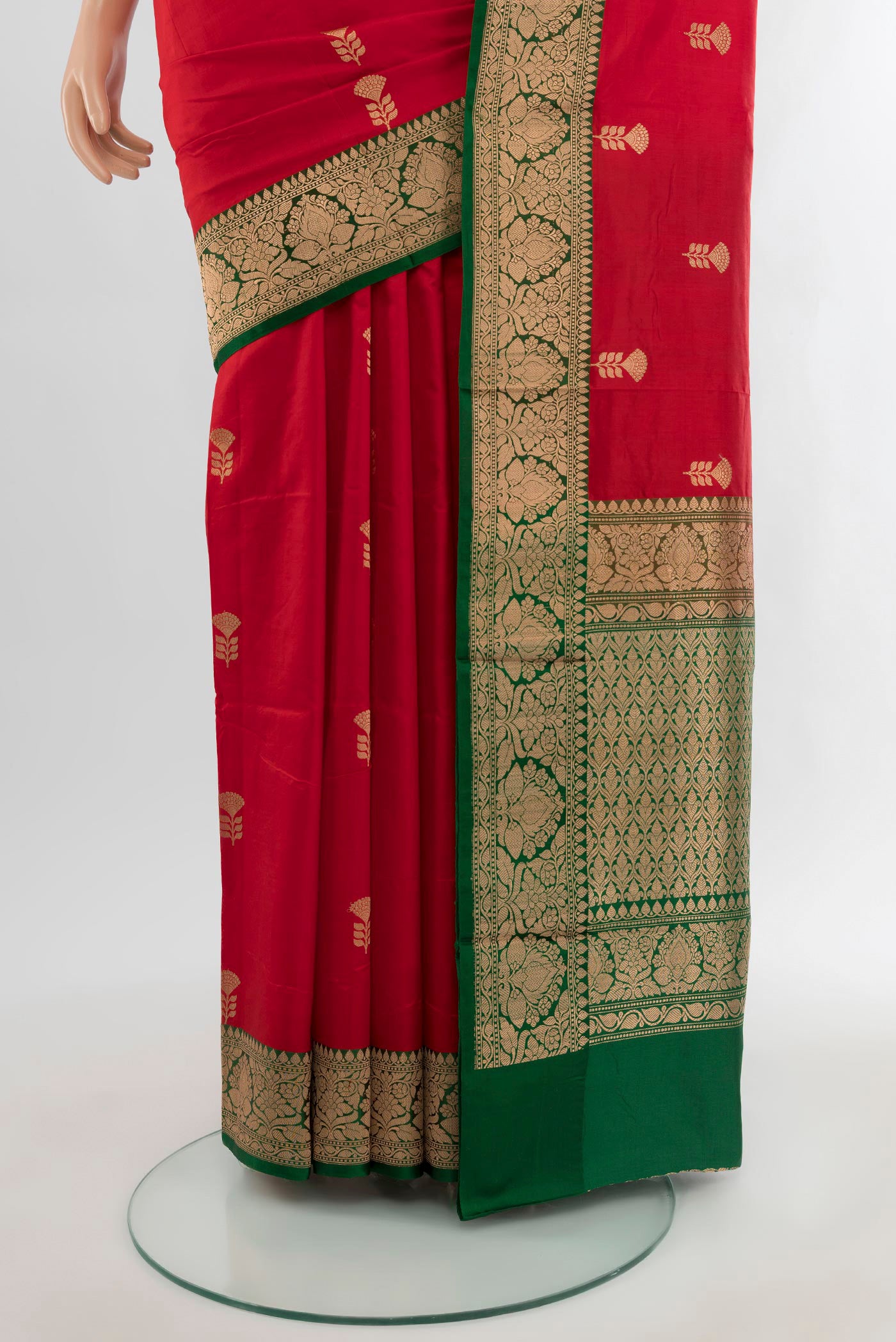 Pleats and pallu of Red Banarasi Katan Silk Saree with Zari Butta on the body and Zari Border. 