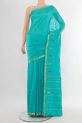 Sky Blue Kanchipuram Silk Saree with Plain Body and Zari Border.  displayed on a mannequin