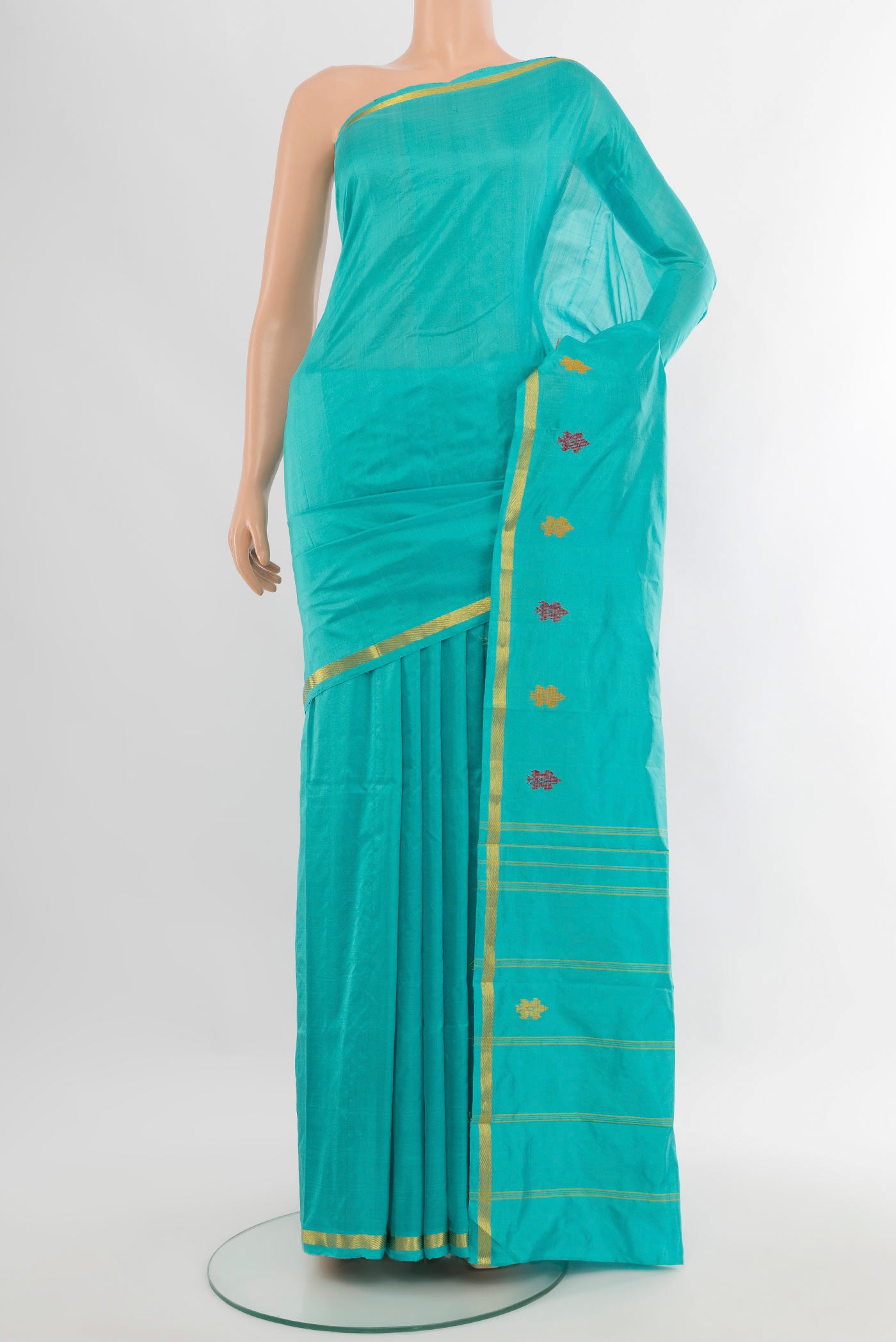 Sky Blue Kanchipuram Silk Saree with Plain Body and Zari Border.  displayed on a mannequin