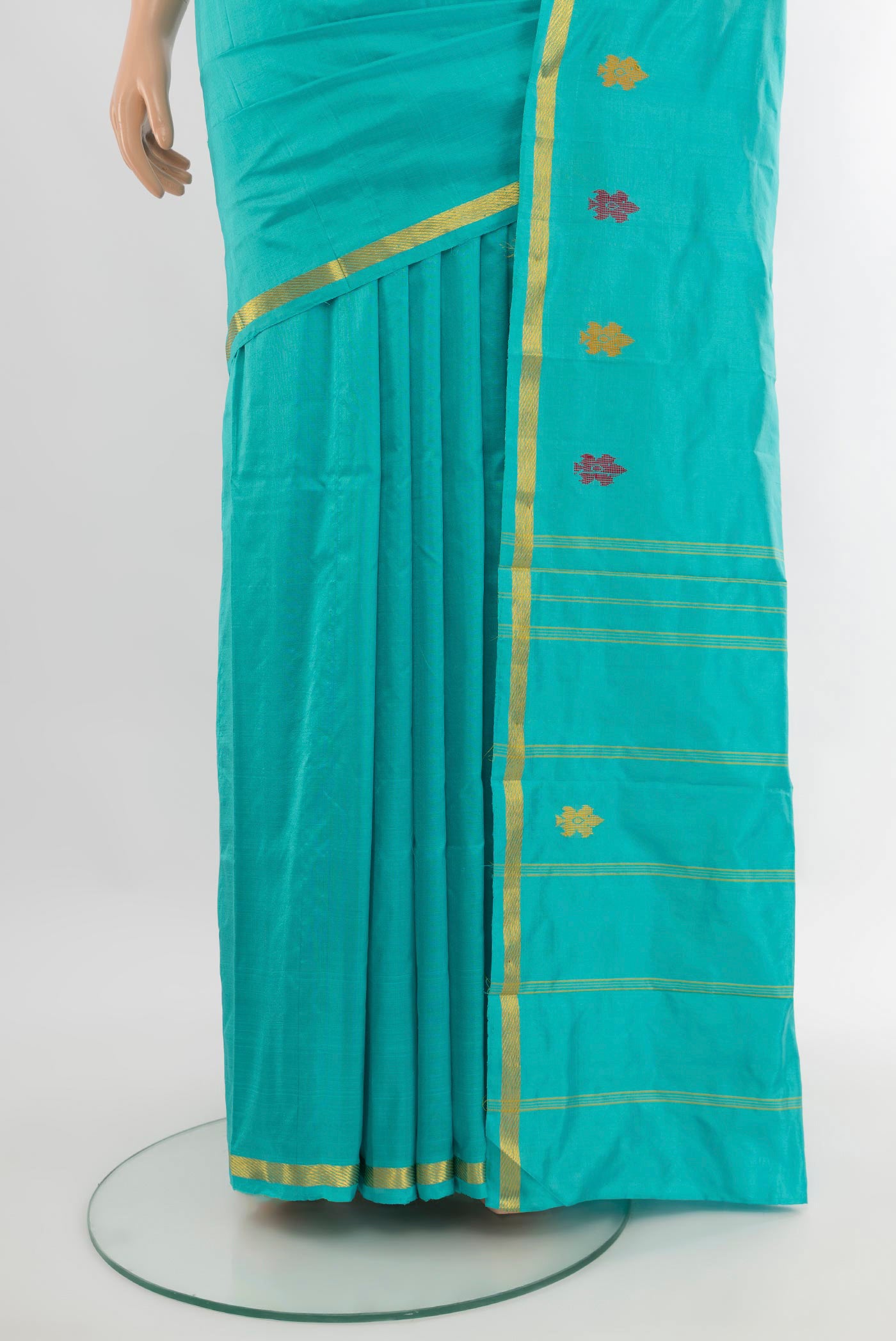Pleats and pallu of Sky Blue Kanchipuram Silk Saree with Plain Body and Zari Border. 