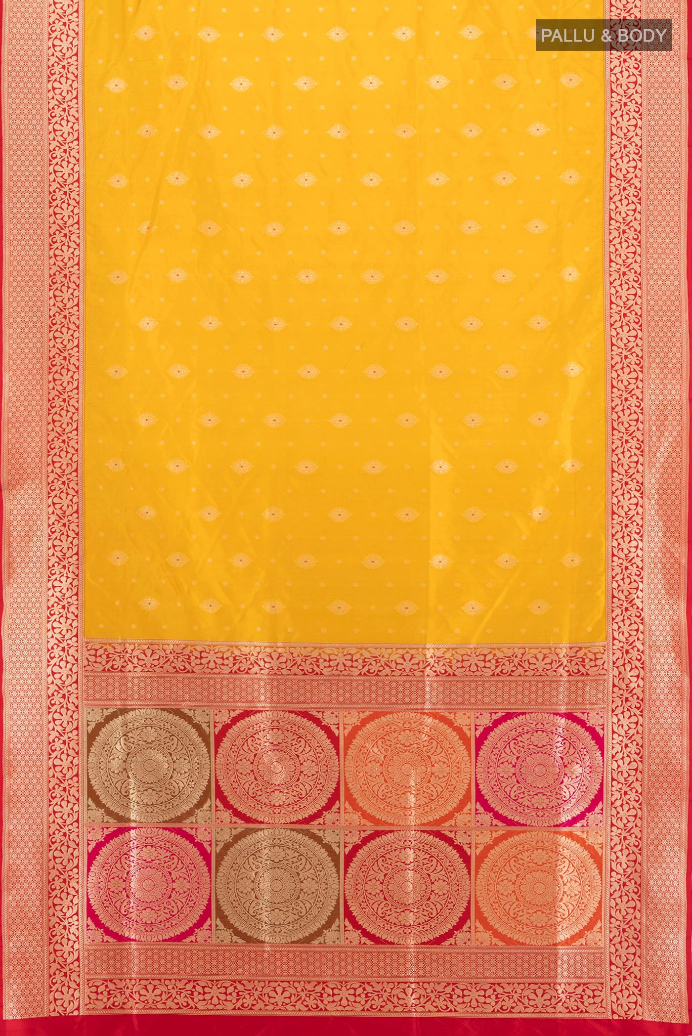 Flat view of Yellow Banarasi Silk Saree with Zari Butta on the body and Zari Border. 