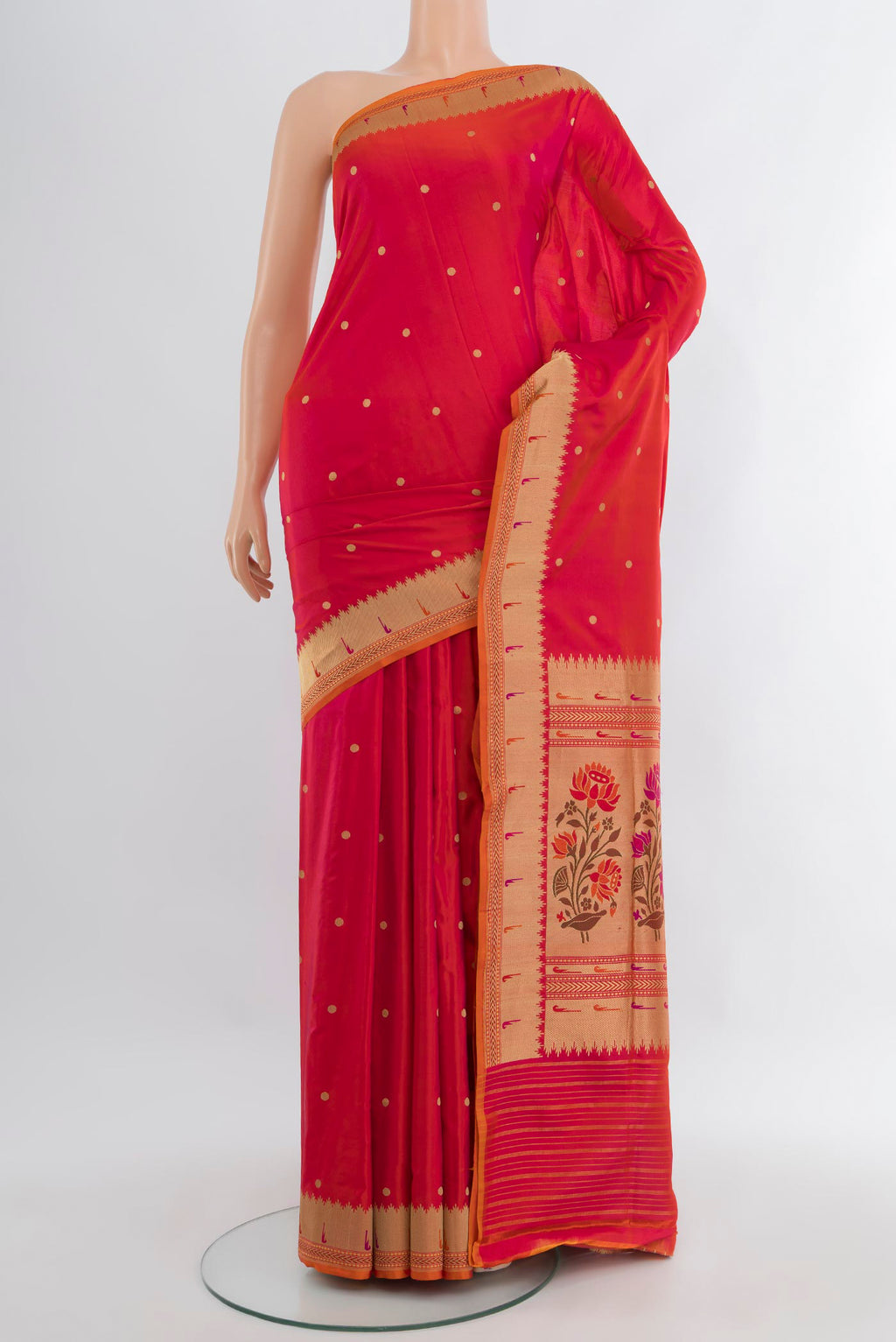 Pink with Orange Color Banarasi Silk Saree with Zari Butta on the body and Zari Border.  displayed on a mannequin