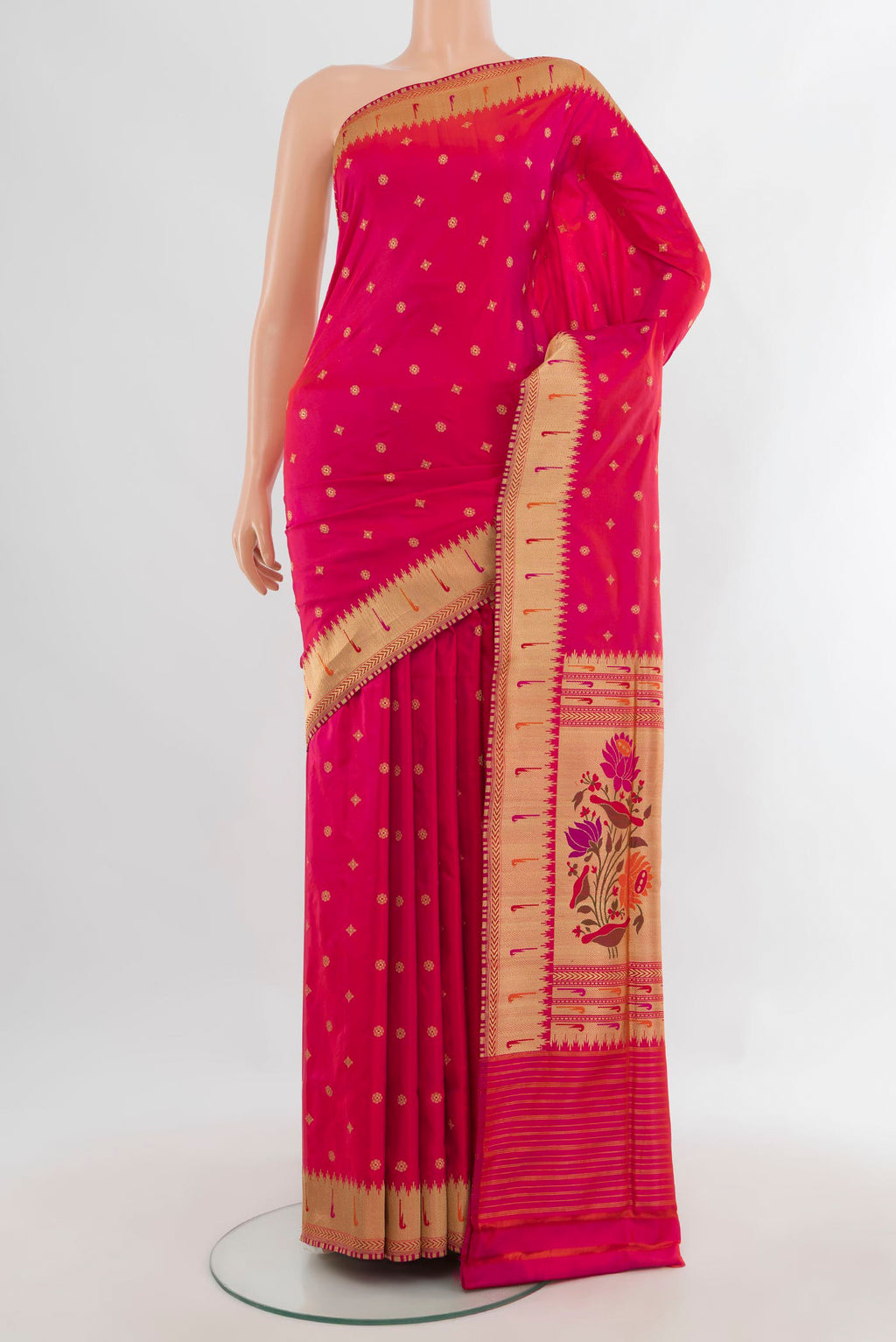 Pure Silk Pink Banarasi Saree with Zari Butta on the body and Zari Border.  displayed on a mannequin