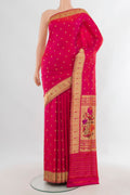 Pure Silk Pink Banarasi Saree with Zari Butta on the body and Zari Border.  displayed on a mannequin