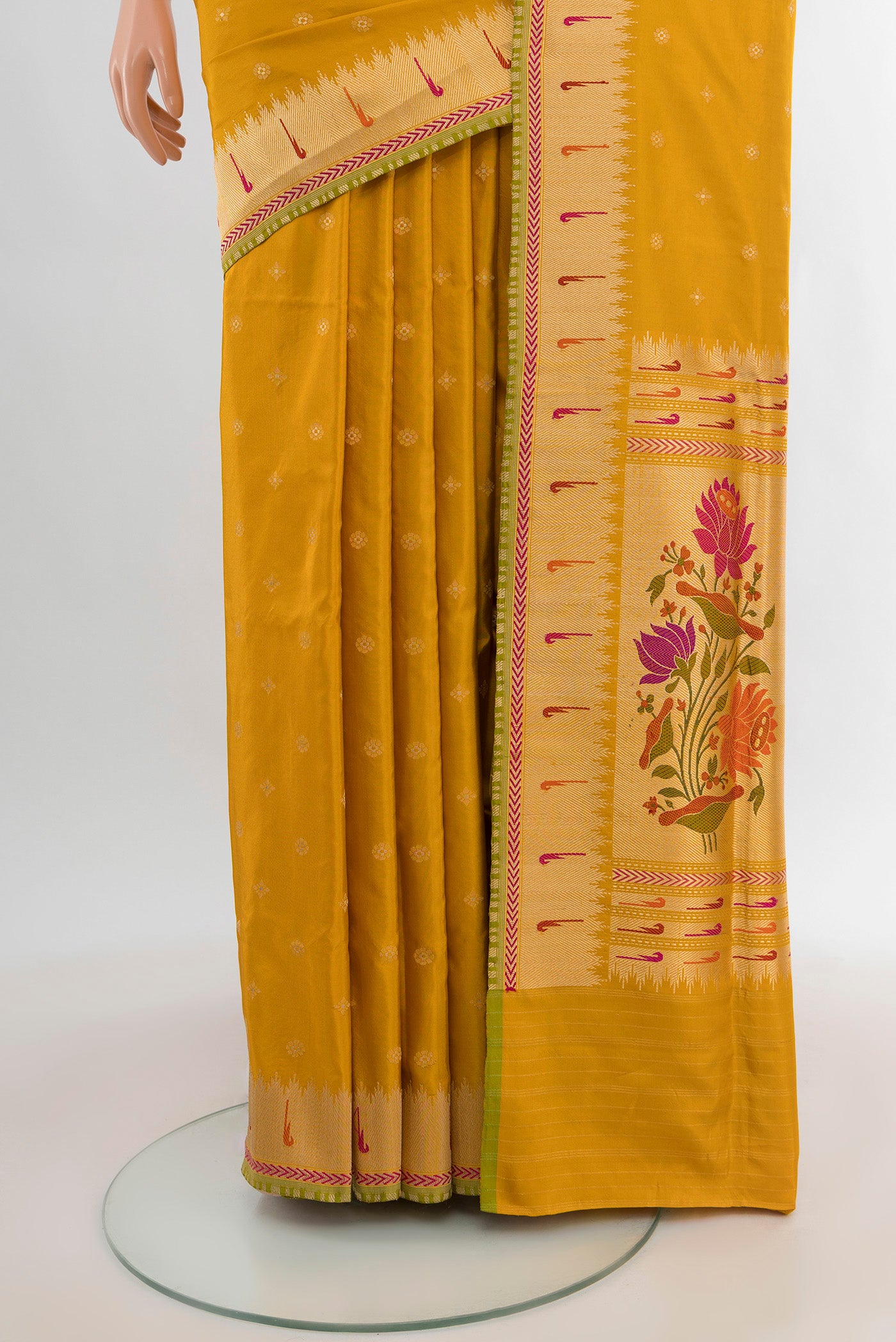 Pleats and pallu of Yellow Banarasi Silk Saree with Zari Butta on the body and Zari Border. 