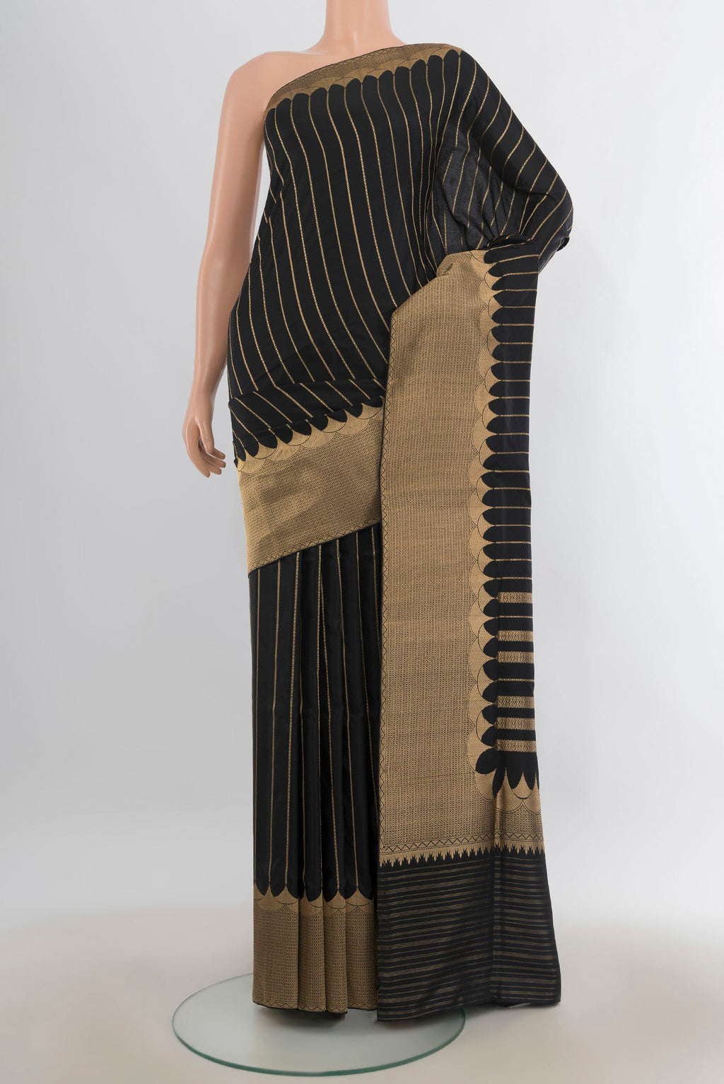 Pure Silk Black Banarasi Saree with Stripes on the body and Zari Border.  displayed on a mannequin