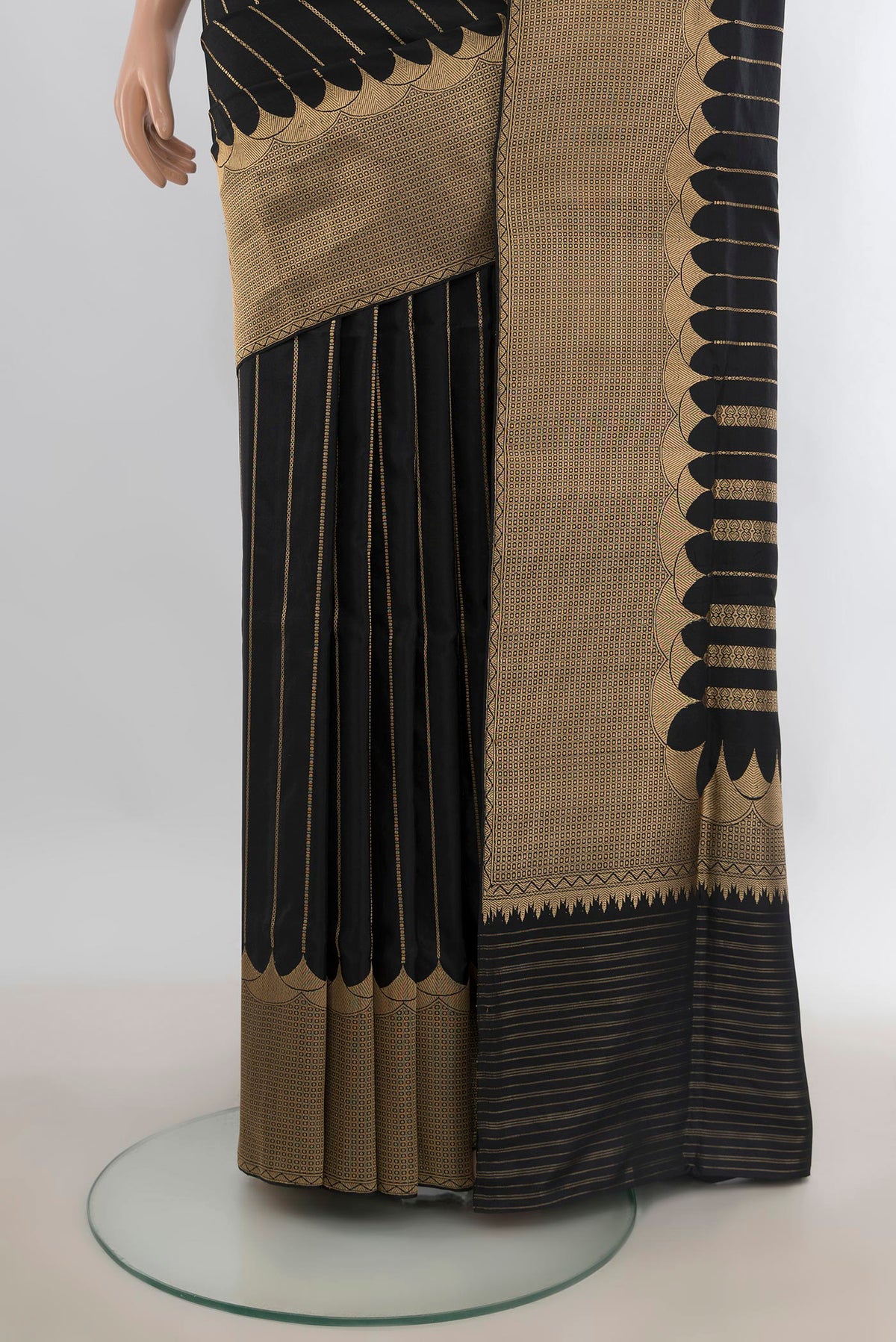 Pleats and pallu of Pure Silk Black Banarasi Saree with Stripes on the body and Zari Border. 