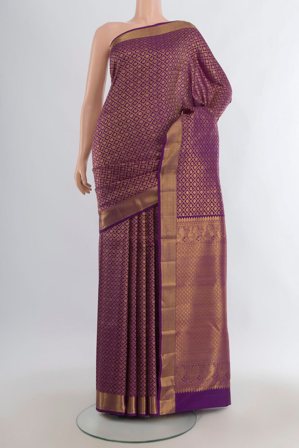 Pure Silk Violet Kanchipuram Saree with Zari Brocade on the body and Zari Border.  displayed on a mannequin