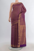 Pure Silk Violet Kanchipuram Saree with Zari Brocade on the body and Zari Border.  displayed on a mannequin