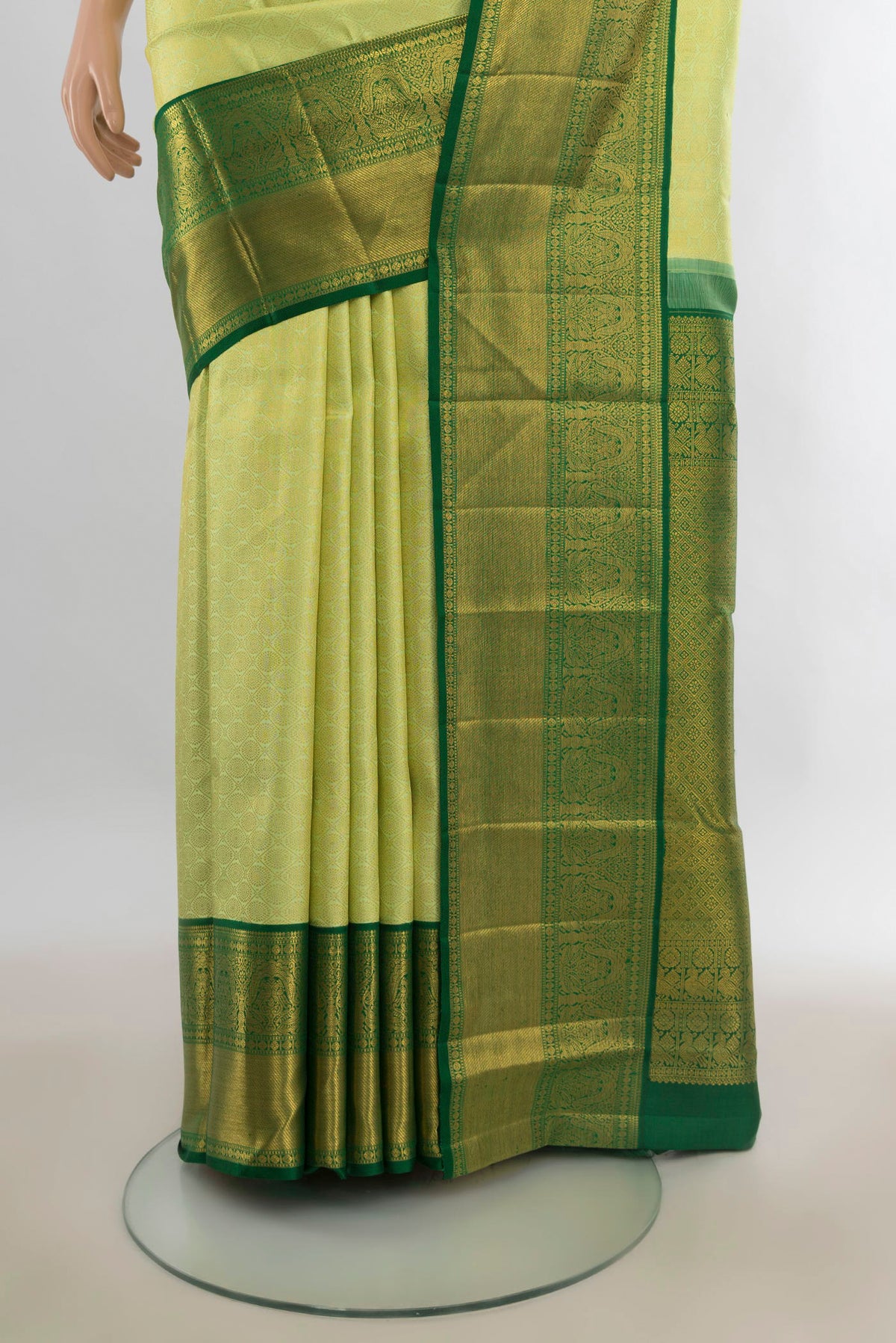 Pleats and pallu of Pure Silk Pista Green Kanchipuram Saree with Zari Brocade on the body and Zari Border. 