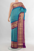 Pure Silk Blue Kanchipuram Saree with Zari Brocade on the body and Zari Border.  displayed on a mannequin