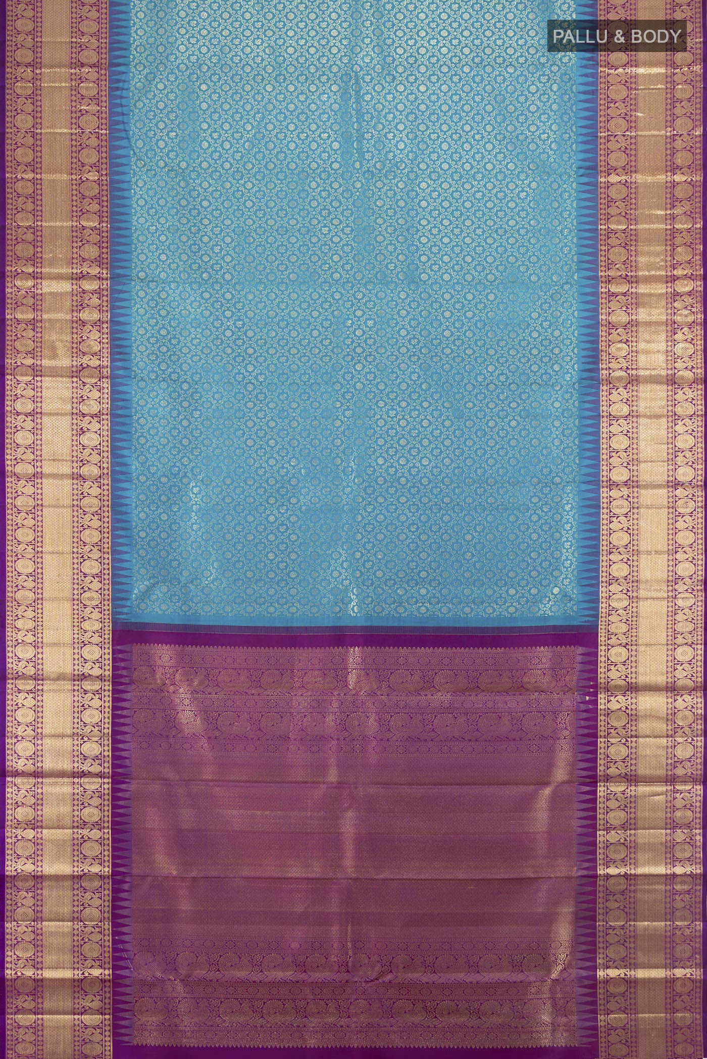 Flat view of Pure Silk Blue Kanchipuram Saree with Zari Brocade on the body and Zari Border. 