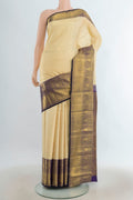 Pure Silk Golden Kanchipuram Saree with Checked design on the body and Silk Border.  displayed on a mannequin