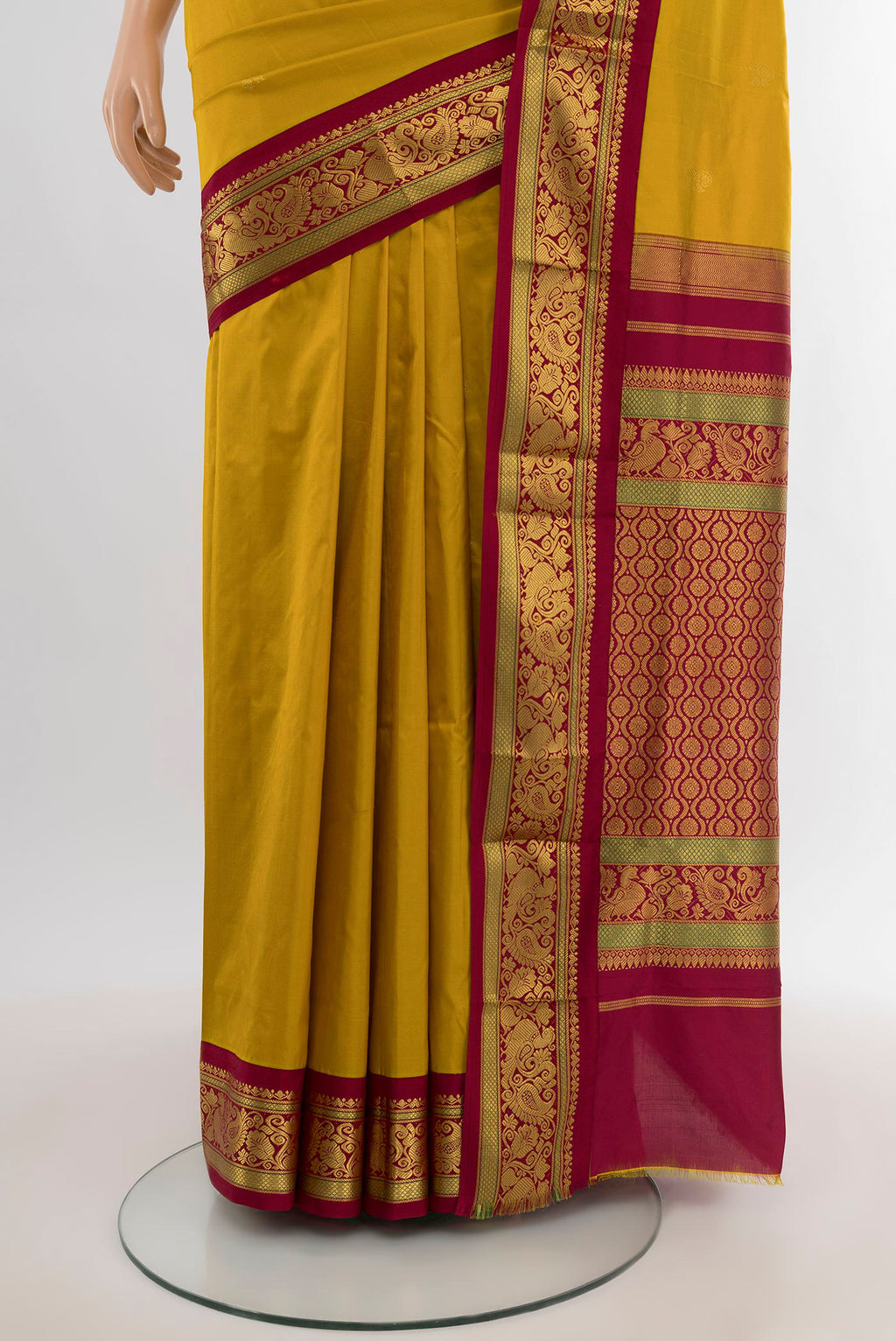 Pleats and pallu of Mustard Bangalore Silk - kadyal Nine Yards Saree with Zari Butta on the body and Zari Border. 