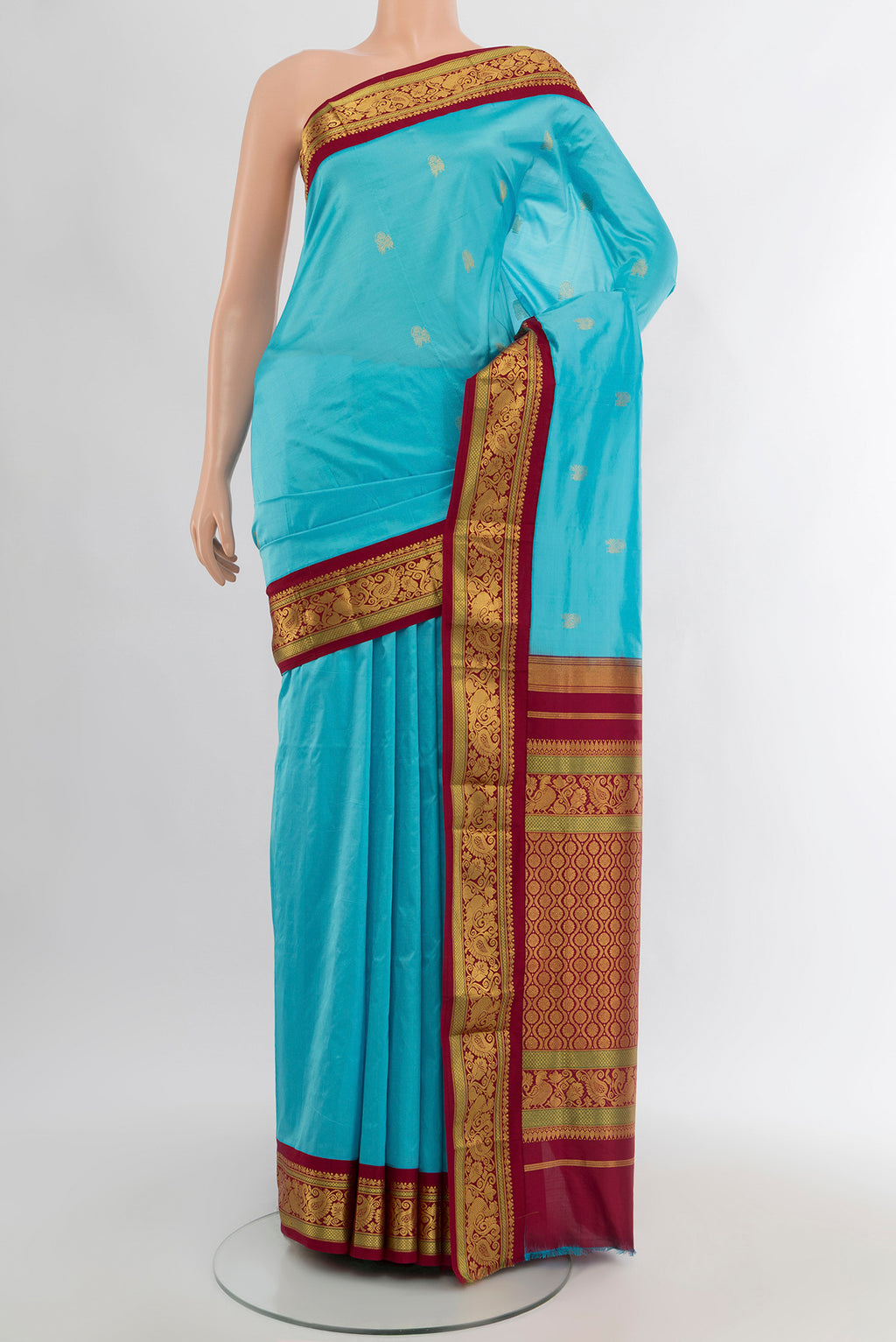 Light Blue Kanchipuram Silk Nine Yards Saree with Zari Butta on the body and Zari Border.  displayed on a mannequin