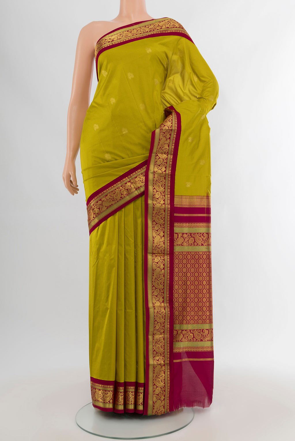 Mehandi Green Kanchipuram Silk Nine Yards Saree with Zari Butta on the body and Zari Border.  displayed on a mannequin