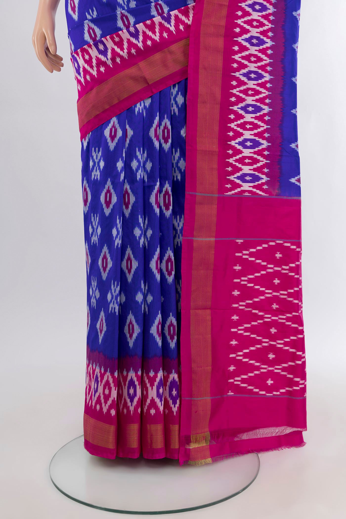 Pleats and pallu of Royal Blue Pochampally Silk Saree with Ikat design on the body and Ikat Border. 
