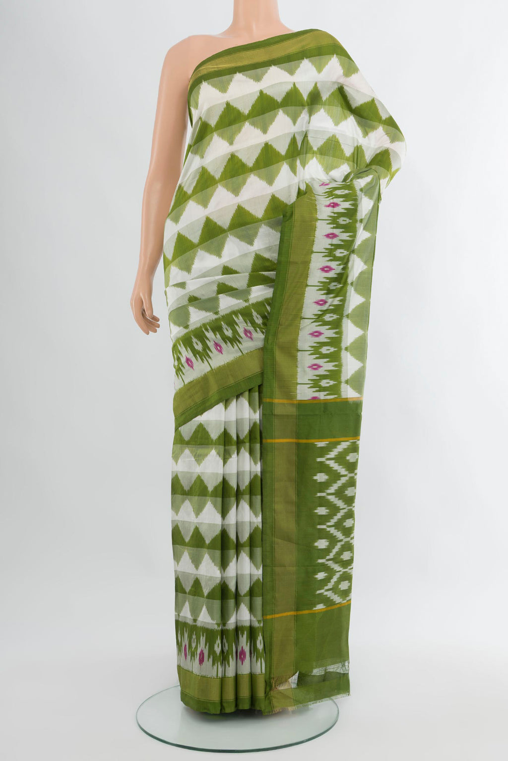White Pochampally Silk Saree with Ikat design on the body and Zari Border.  displayed on a mannequin