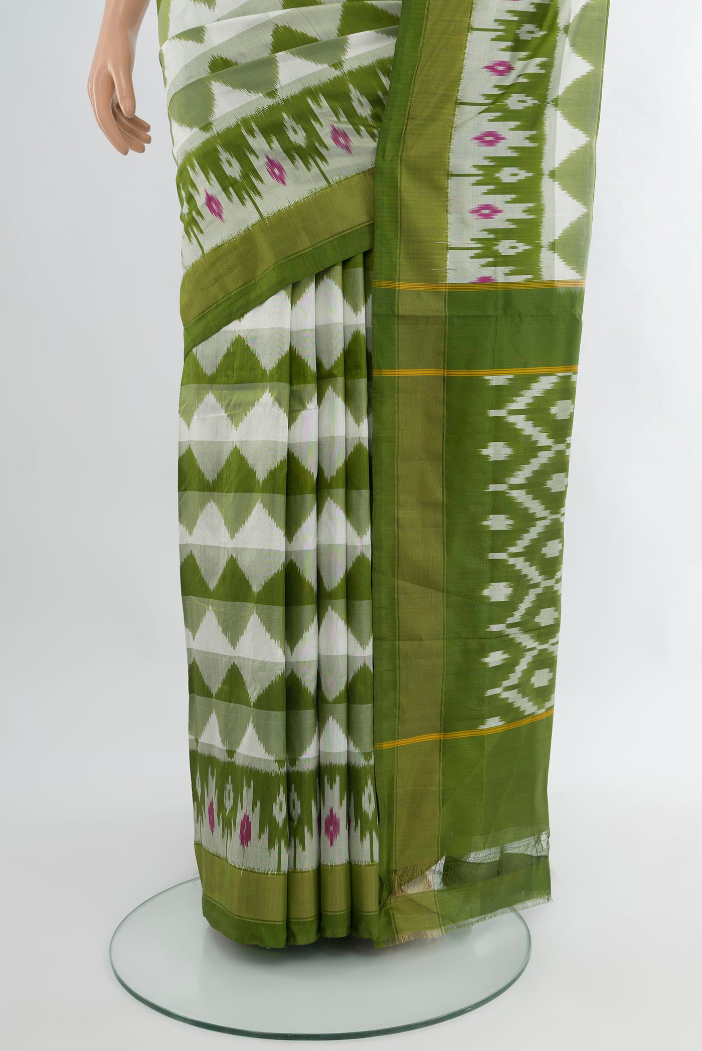 Pleats and pallu of White Pochampally Silk Saree with Ikat design on the body and Zari Border. 