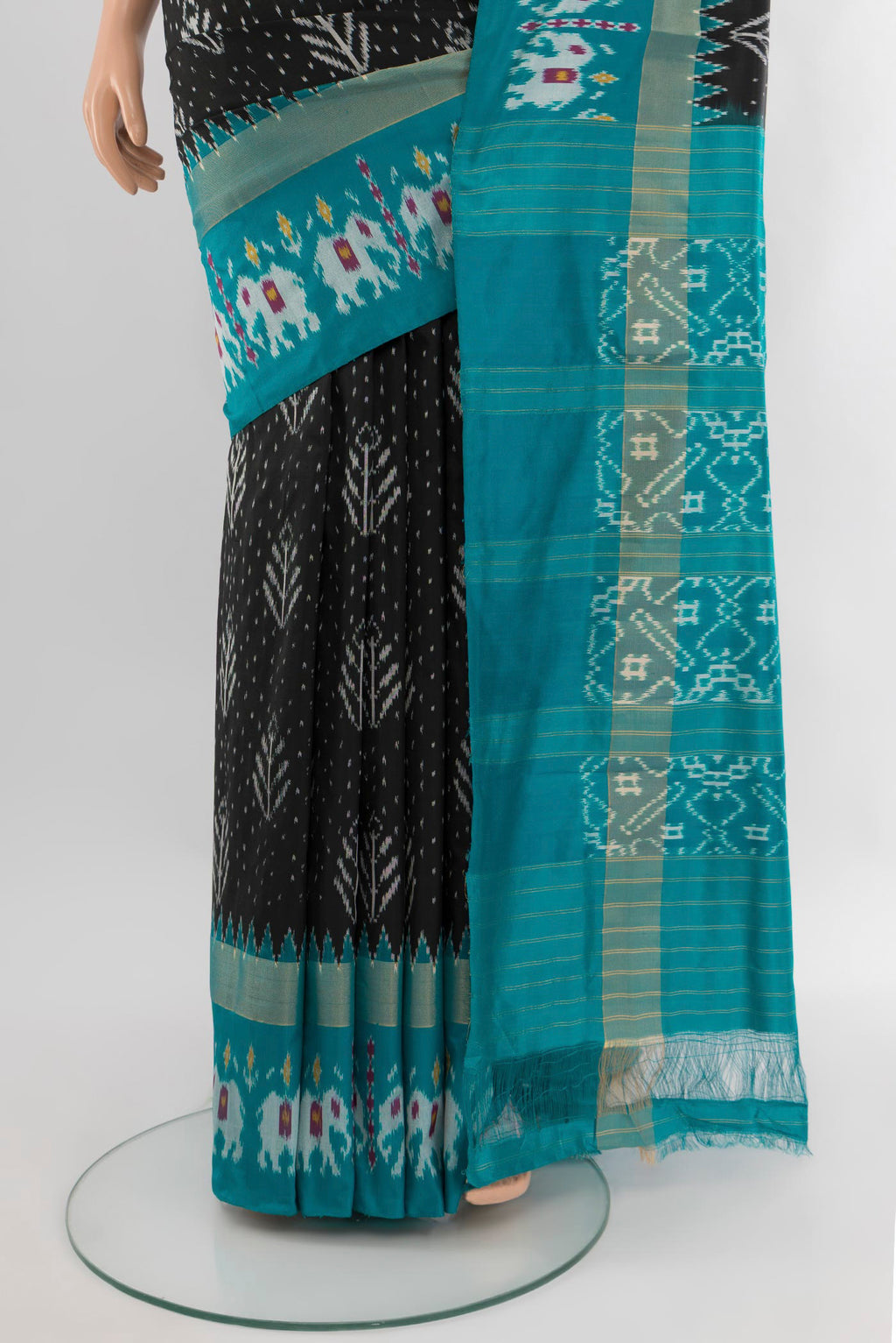 Pleats and pallu of Black Pochampally Silk Saree with Pure Ikat on the body and Zari Border. 