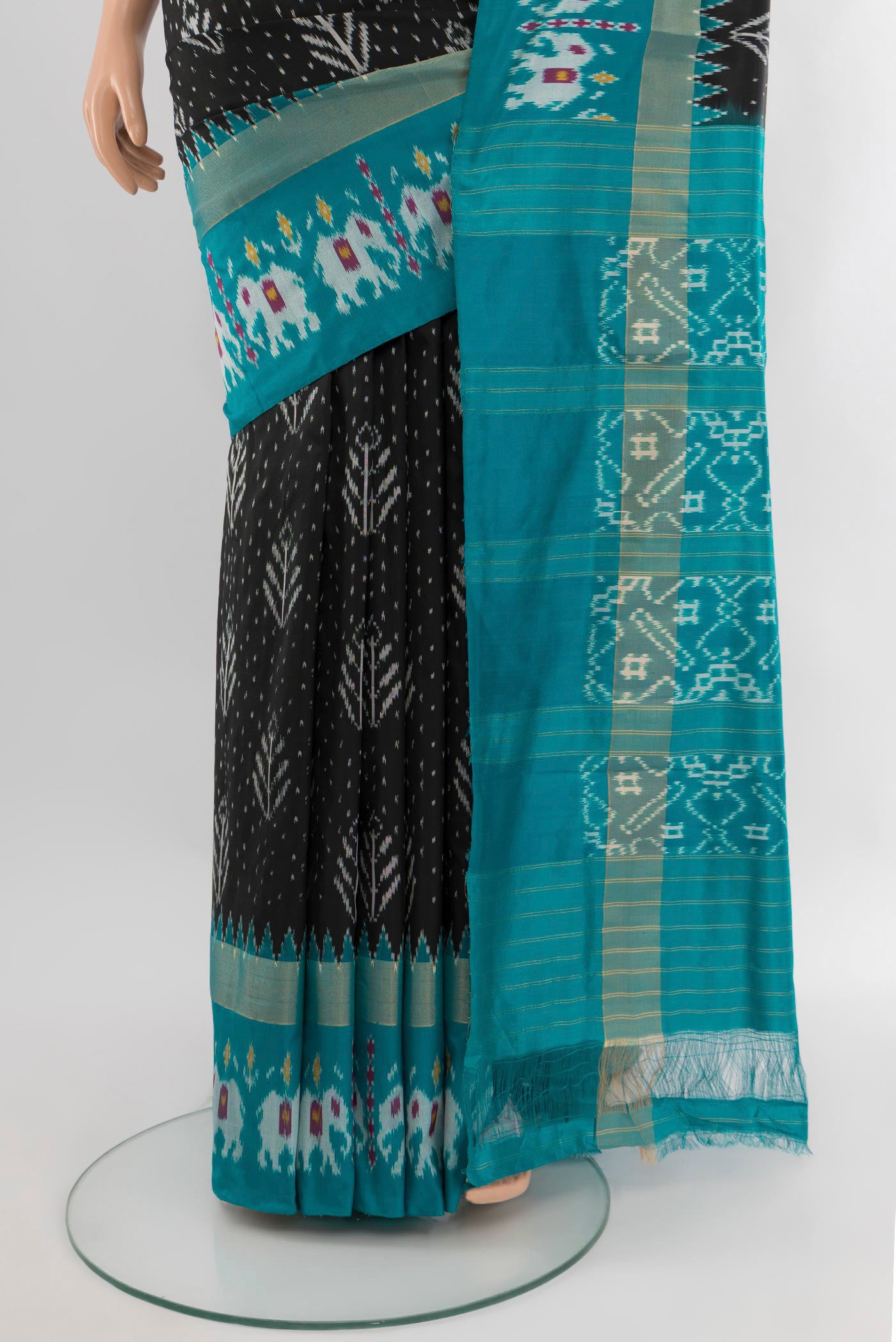 Pleats and pallu of Black Pochampally Silk Saree with Pure Ikat on the body and Zari Border. 