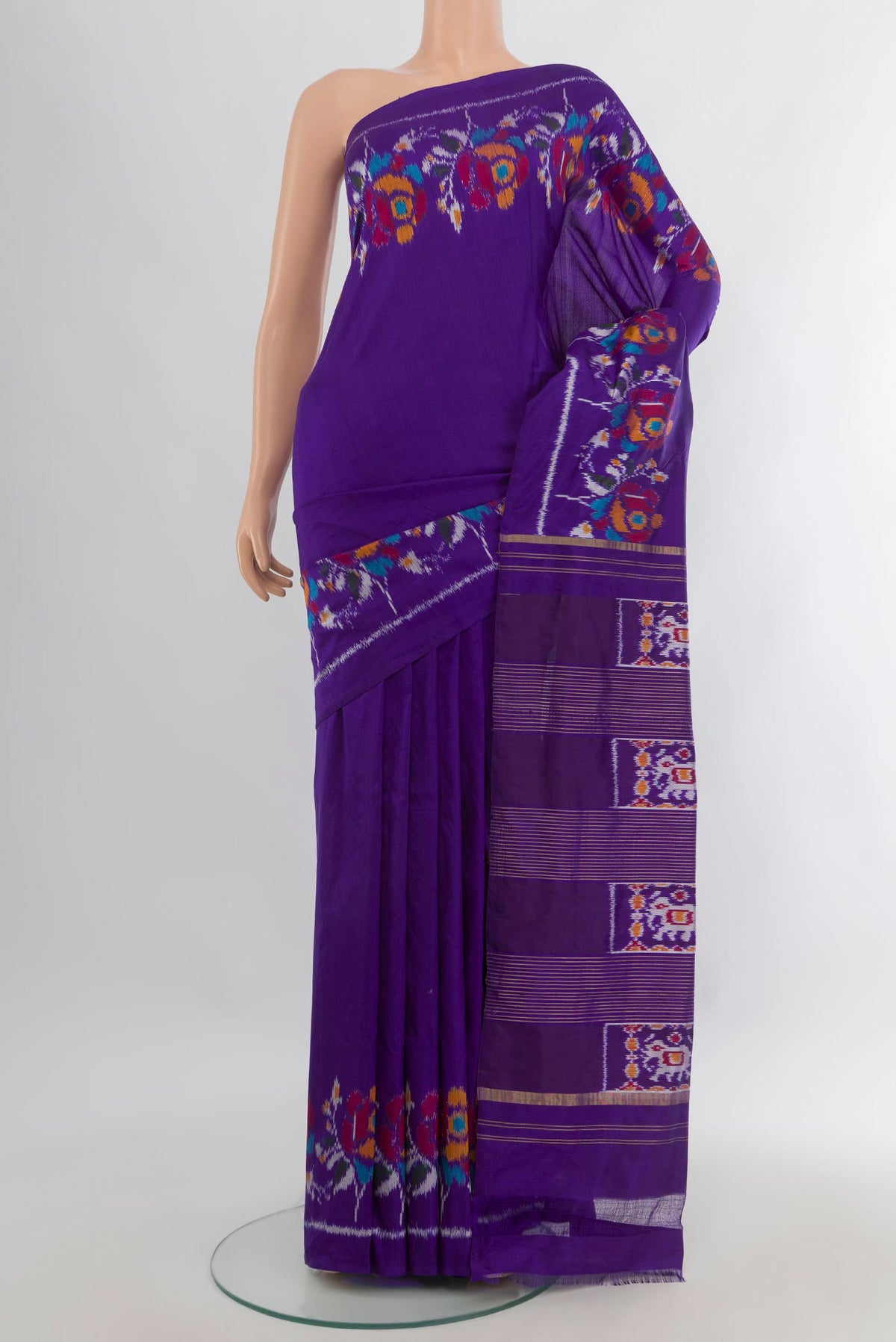 Pure Silk Violet Pochampally Saree with Plain Body and Ikat Border.  displayed on a mannequin