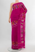 Magenta Pochampally Silk Saree with Plain Body and Fancy Border.  displayed on a mannequin
