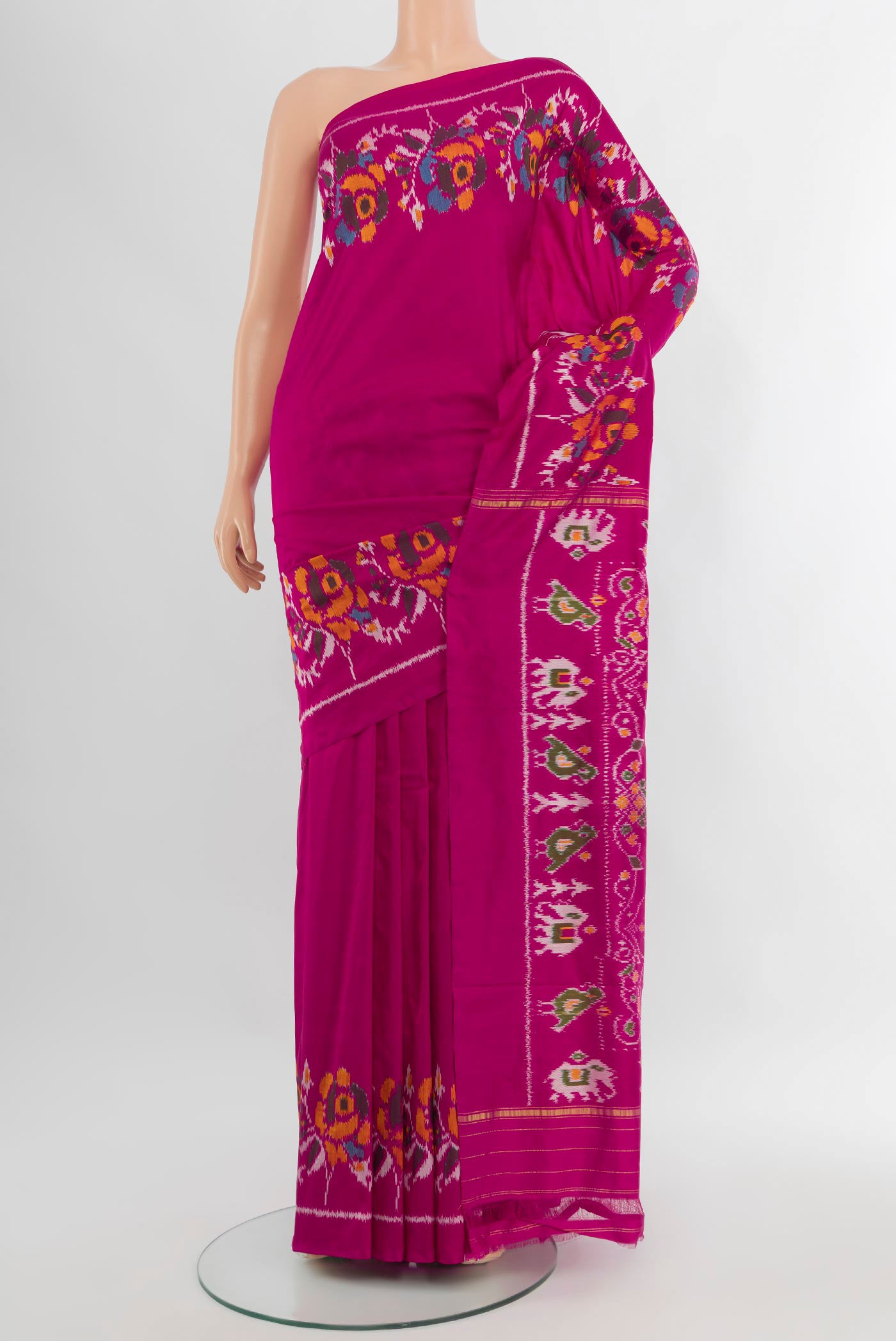 Magenta Pochampally Silk Saree with Plain Body and Fancy Border.  displayed on a mannequin