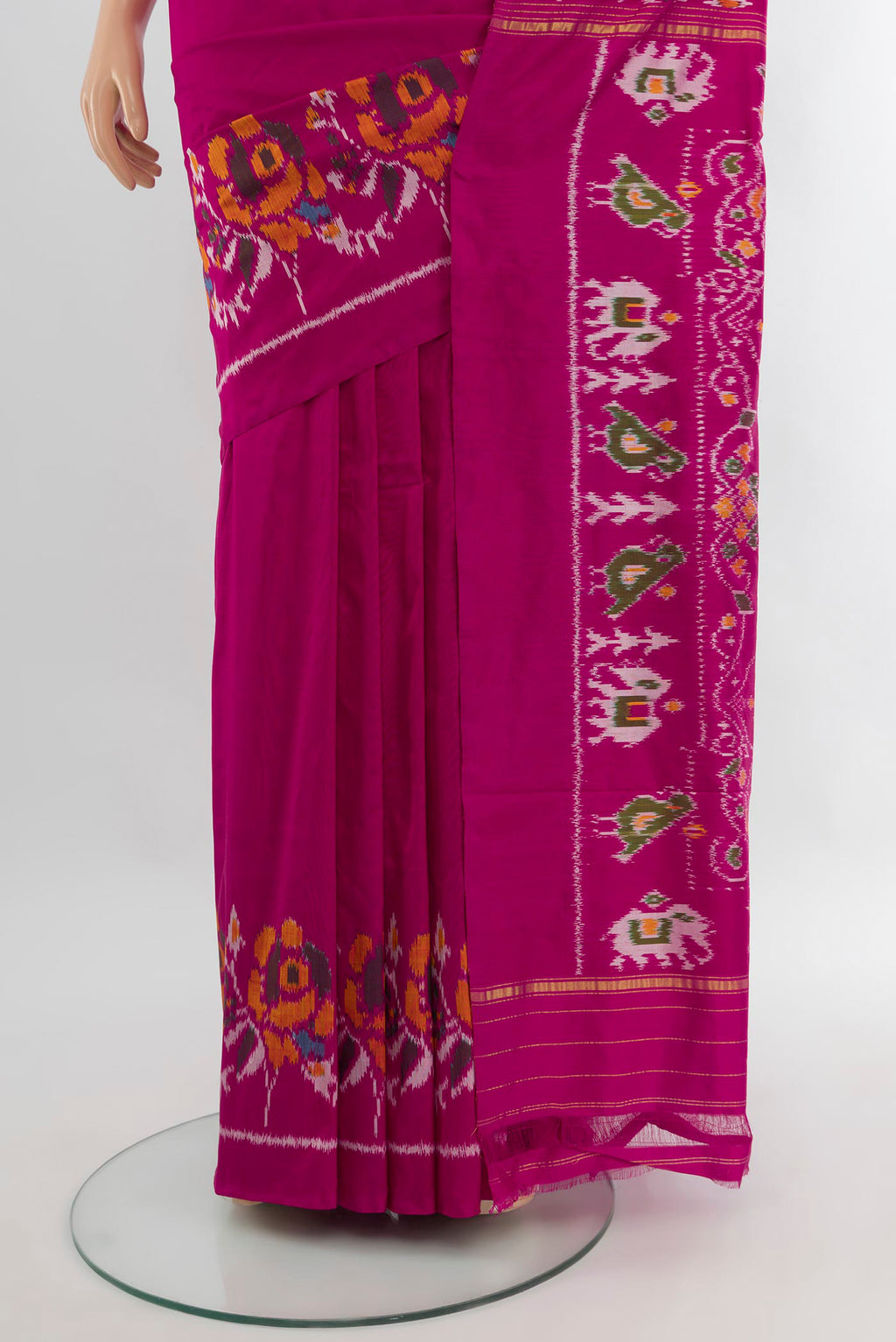 Pleats and pallu of Magenta Pochampally Silk Saree with Plain Body and Fancy Border. 