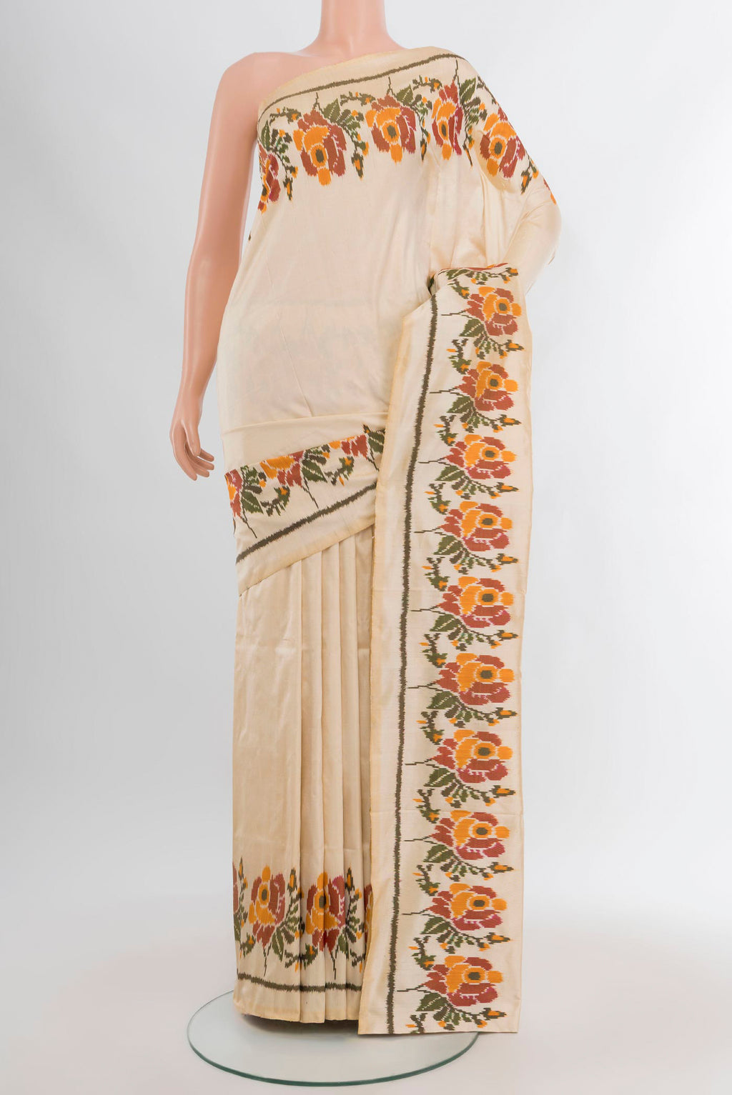 Cream Pochampally Silk Saree with Plain Body and Fancy Border.  displayed on a mannequin
