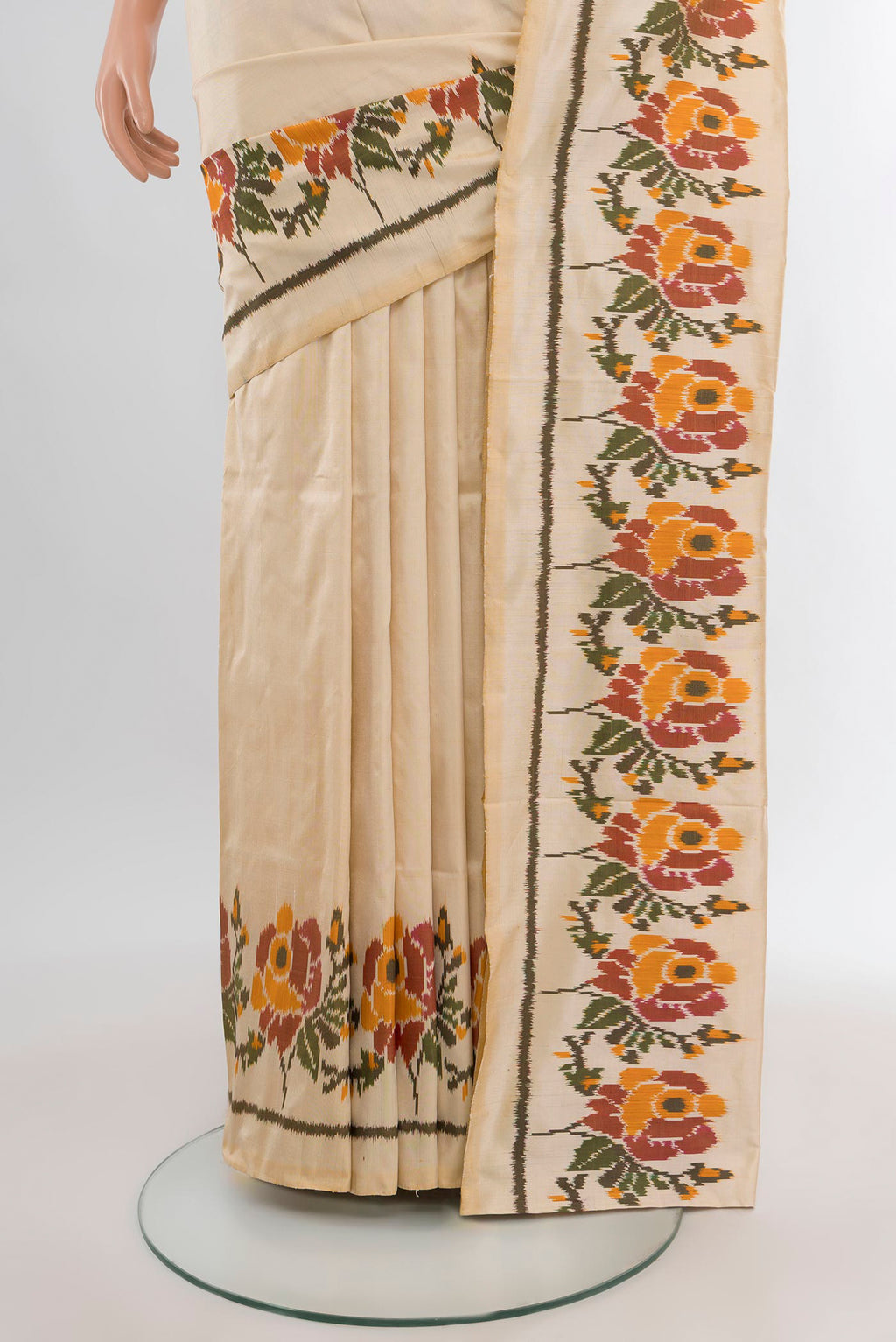 Pleats and pallu of Cream Pochampally Silk Saree with Plain Body and Fancy Border. 