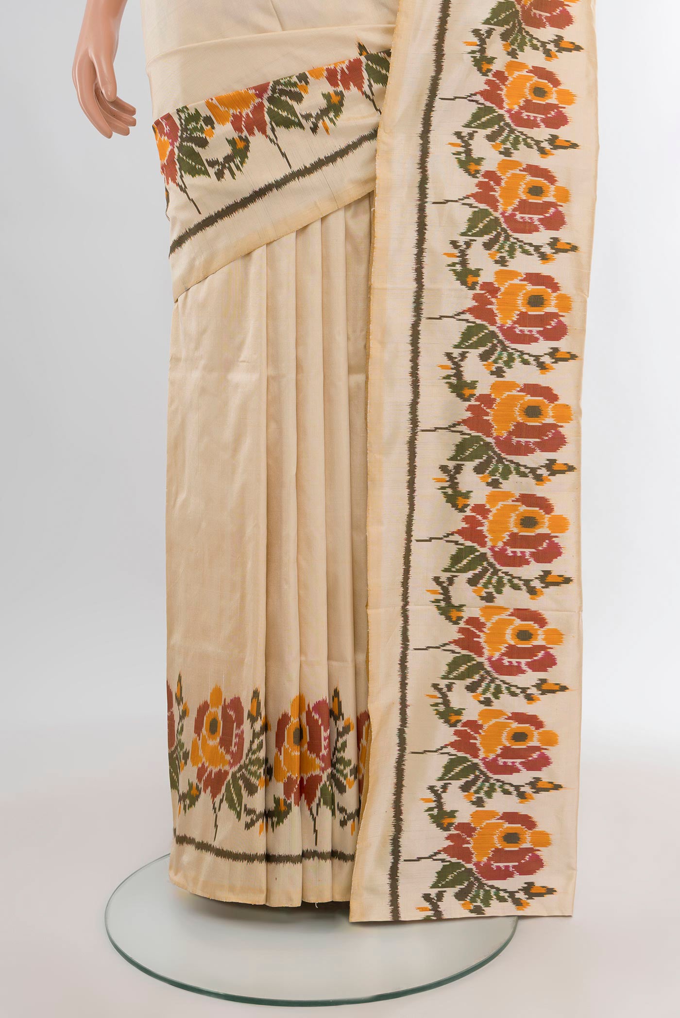 Pleats and pallu of Cream Pochampally Silk Saree with Plain Body and Fancy Border. 