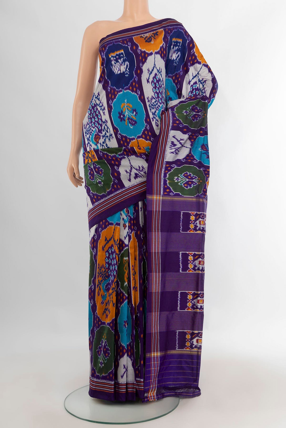 Pure Silk Violet Pochampally Saree with Pure Ikat on the body and Plain Border.  displayed on a mannequin
