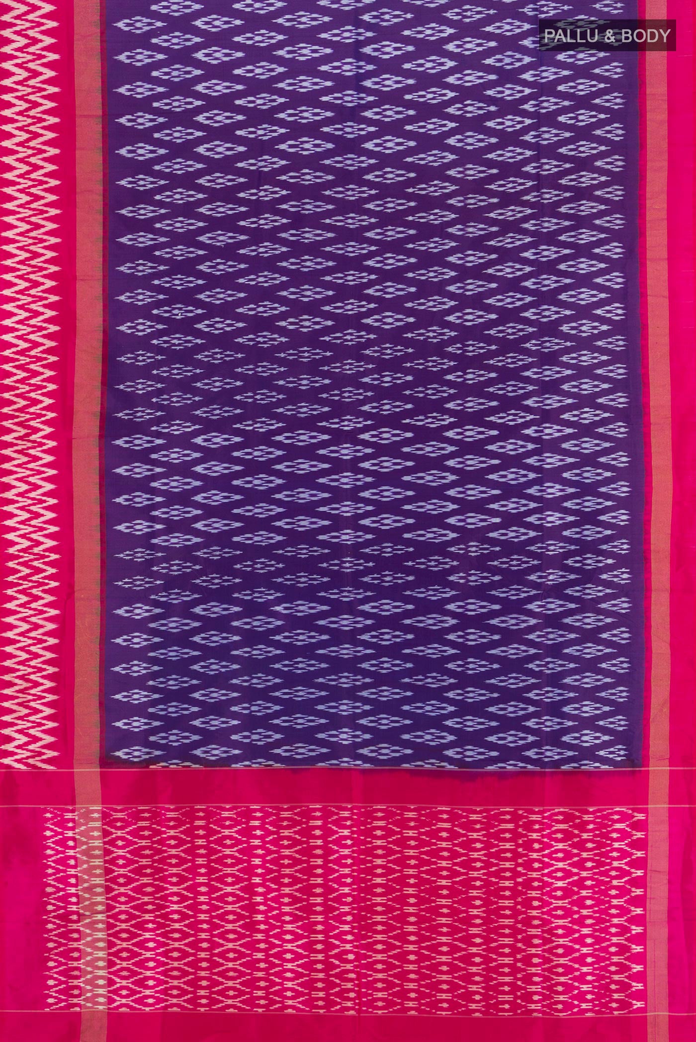 Flat view of Violet Pochampally Silk Saree with Ikat design on the body and Ikat Border. 