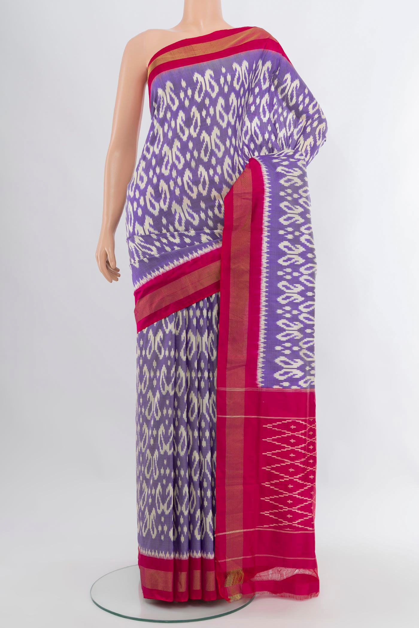 Lavender Pochampally Silk Saree with Pure Ikat on the body and Zari Border.  displayed on a mannequin
